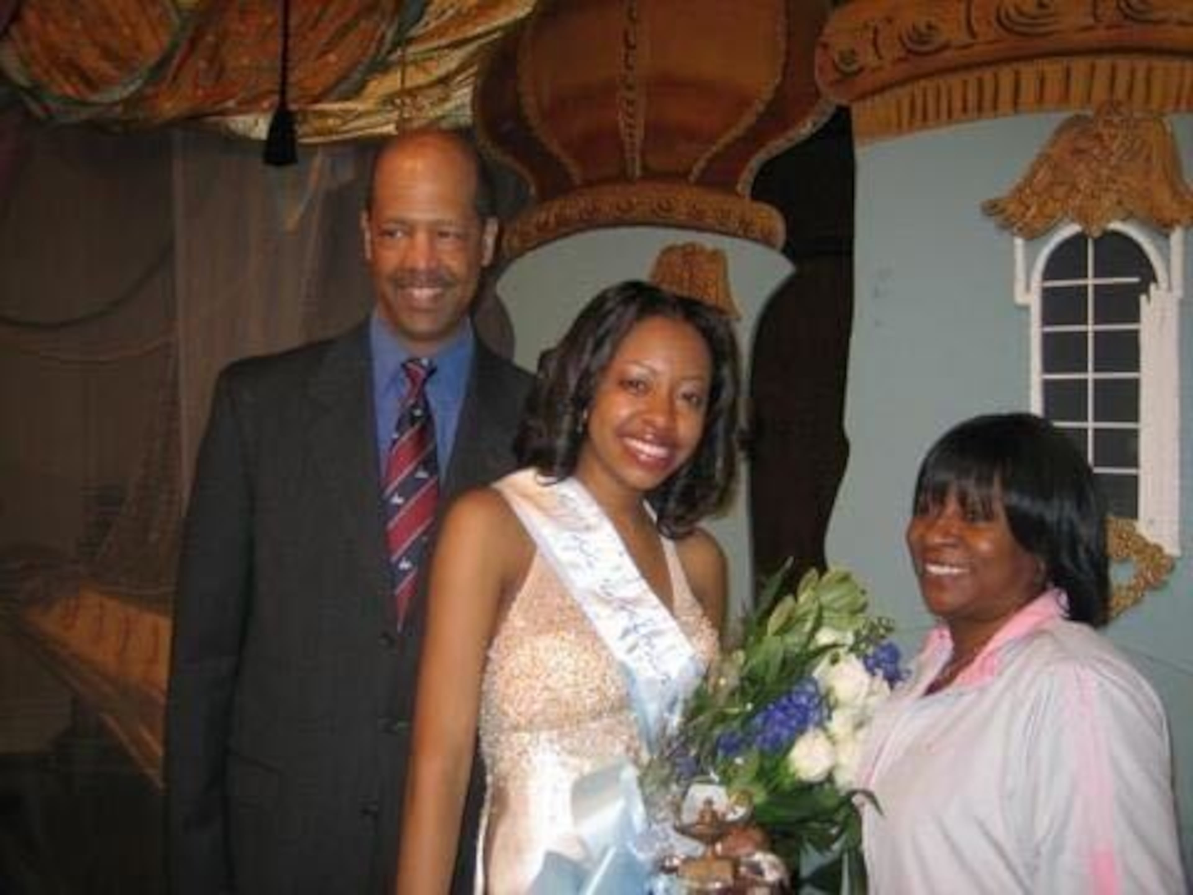 Terricha Phillips with her parents after being crowned Miss Spelman College. (Courtesy of Terricha Phillips)