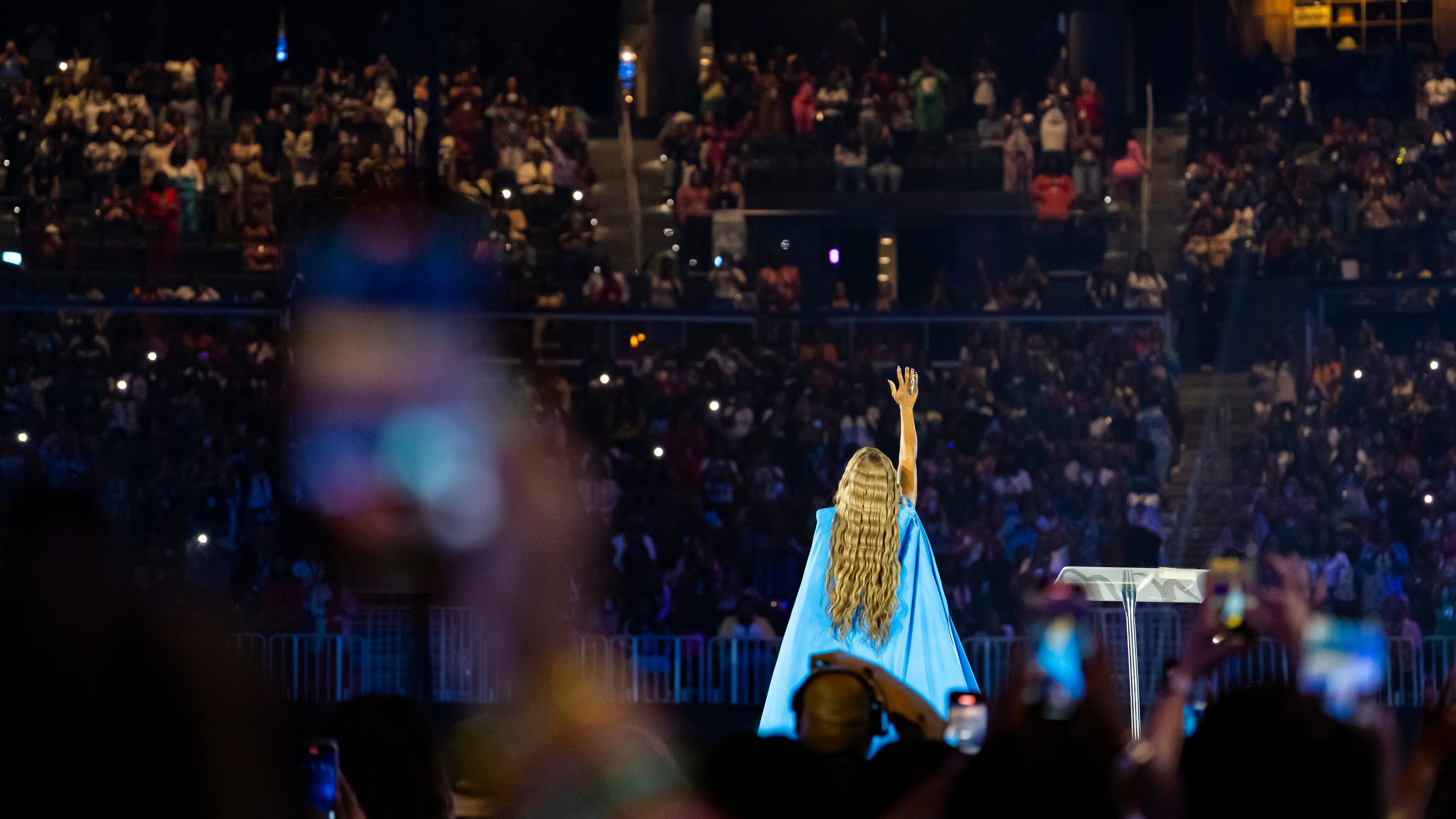Pastor Sarah Jakes Roberts preaches during the Woman Evolve conference, Thursday, Aug. 1, 2025, in Atlanta. Roberts, the daughter of Bishop T.D. Jakes, leads The Potter’s House alongside her husband and founded the Woman Evolve movement to empower women through faith. (Olivia Bowdoin for the AJC)
