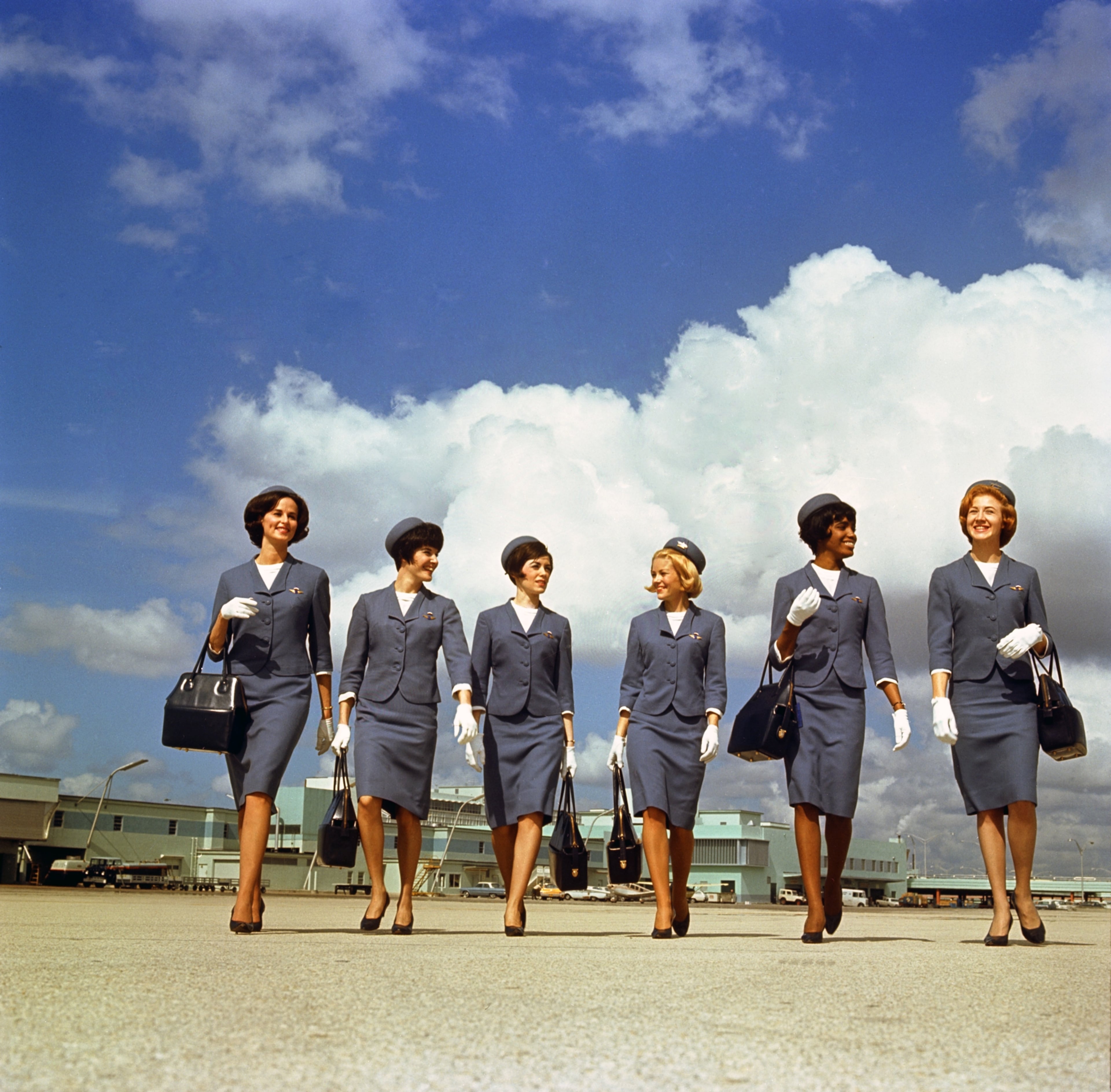 Phenola A. Culbreath, the second Black flight attendant hired by Delta in 1966, is featured in an image showing the uniforms from the late 1960s. (Courtesy of Delta Air Lines)
