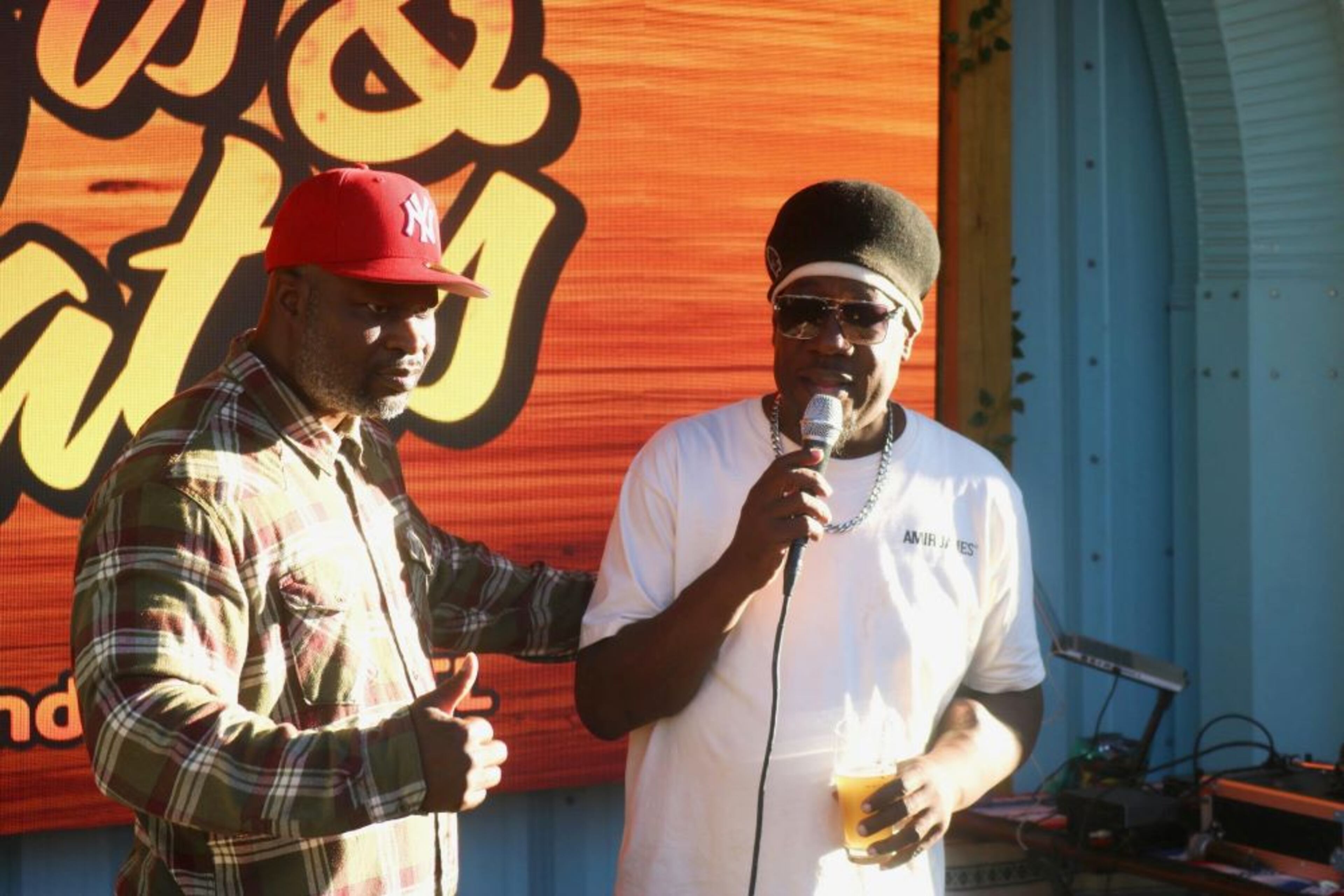 Event host David “Fort Knox” Freeman Jr. (left) used Andre "D.R.E.S. Tha Beatnik" Lett's crowd control methods as inspiration for his own energetic stage presence. (Courtesy of Mercury Storm)