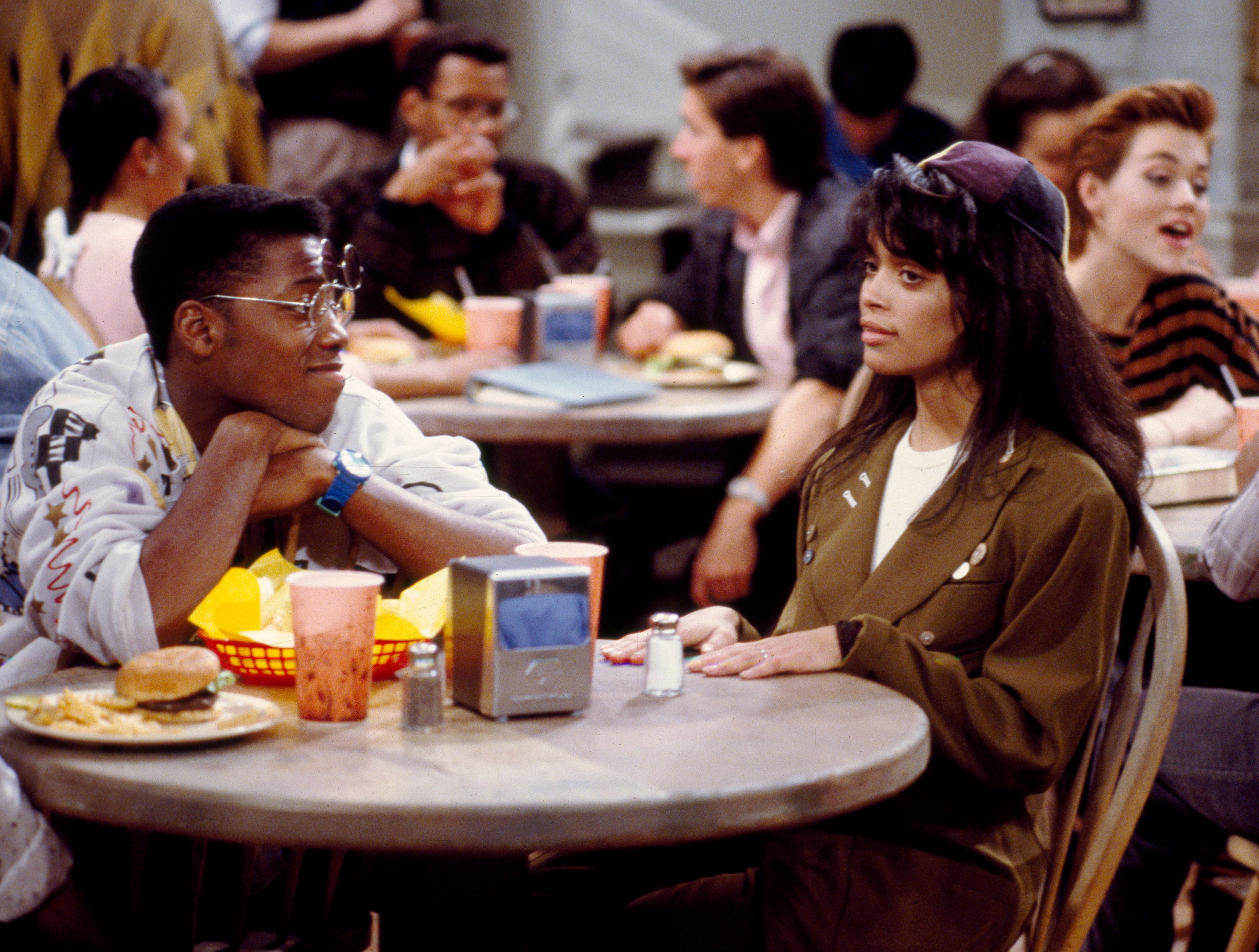 (From left) Kadeem Hardison as Dwayne Wayne and Lisa Bonet as Denise Huxtable in a scene from Episode 17 "Mr. Hillman" of Season 1 of "A Different World." (Bob Gersny/NBC/NBCU Photo Bank via Getty Images)