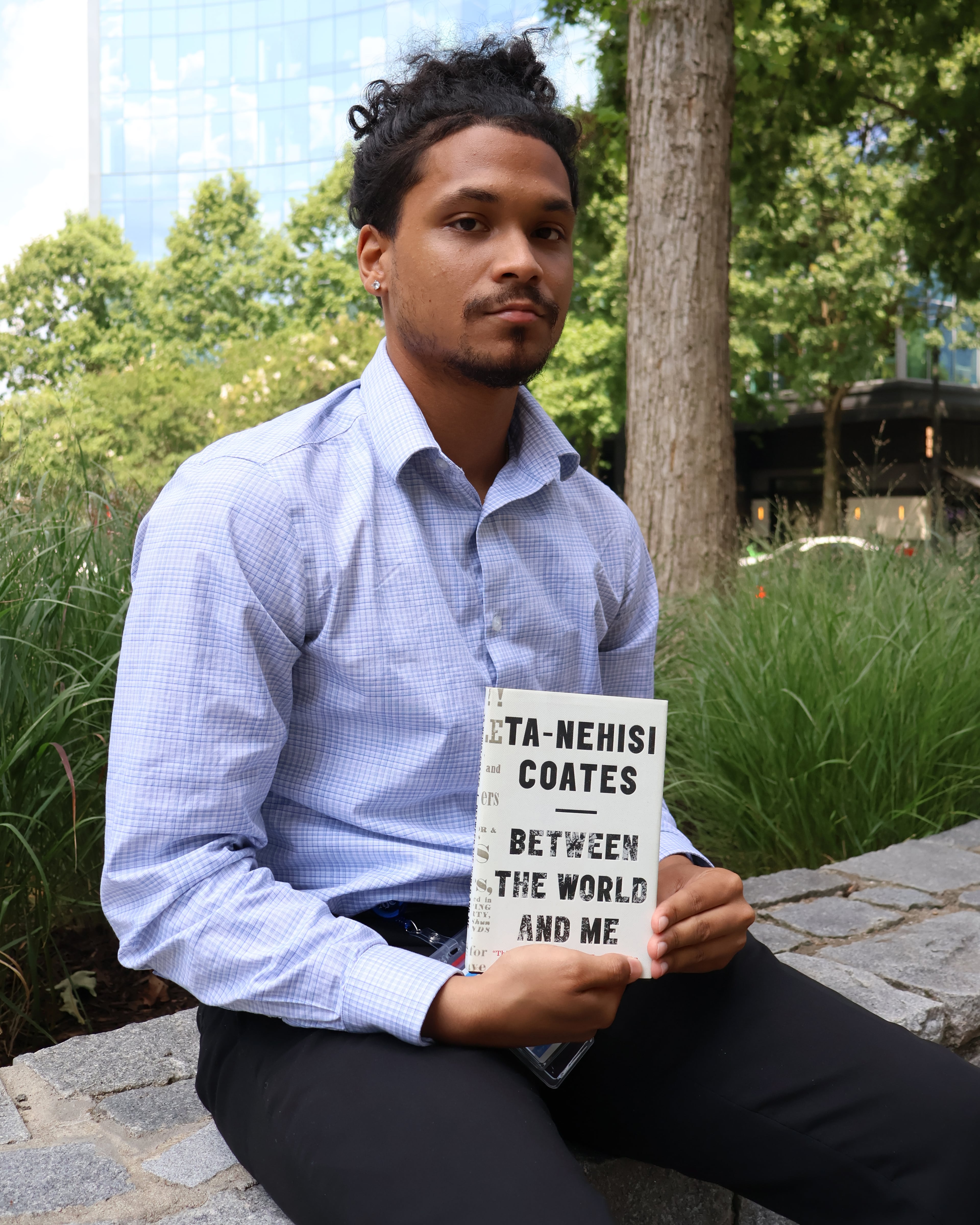 Elijah Megginson, a local news intern from Morehouse College, recommends “Between the World and Me” by Ta-Nehisi Coates. (Kevin Pernell/AJC)
