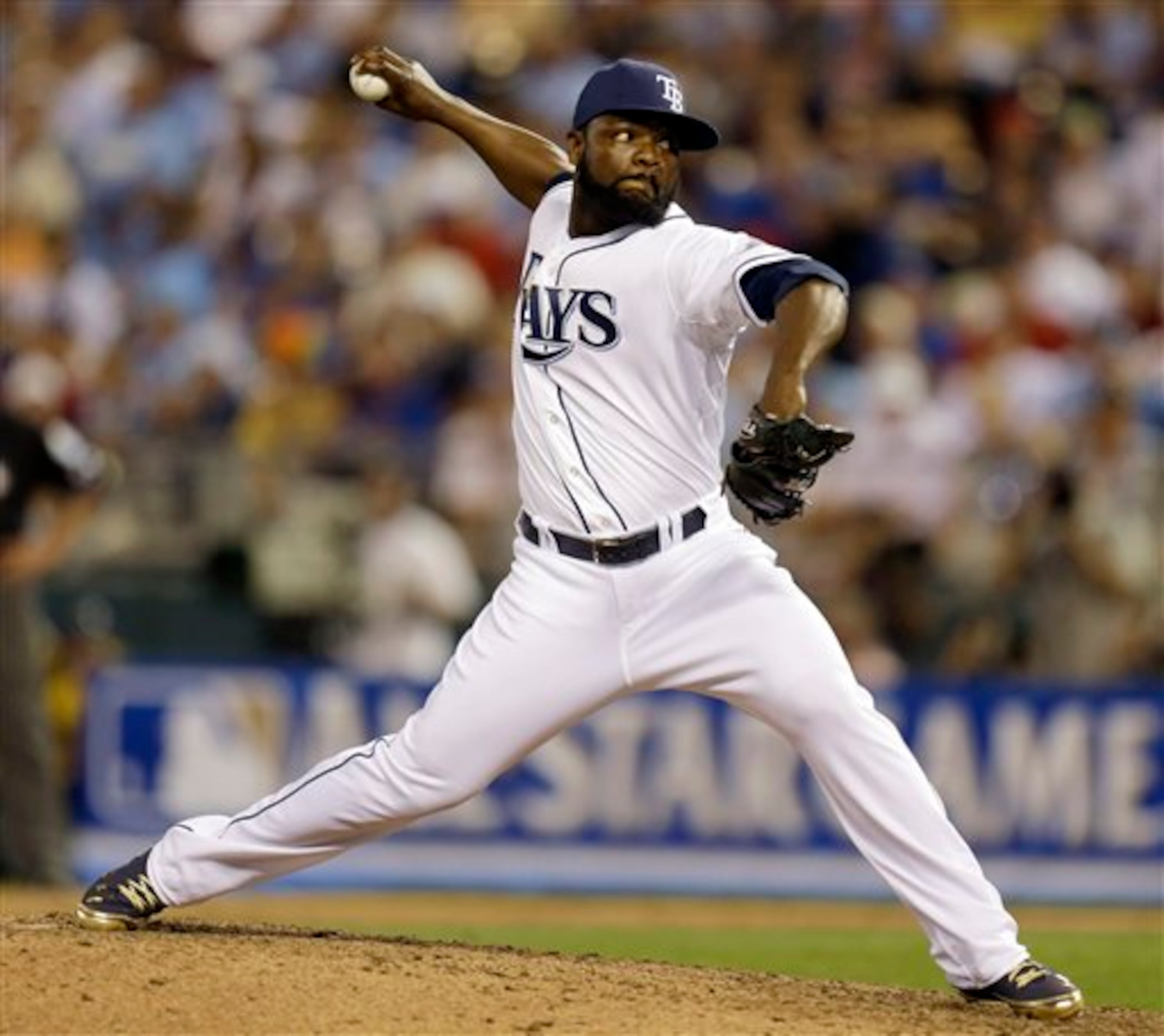 American League's Fernando Rodney, of the Tampa Bay Rays, delivers against the National League during the ninth inning of the MLB All-Star baseball game, Tuesday, July 10, 2012, in Kansas City, Mo. The National League won 8-0. (Jeff Roberson/AP)
