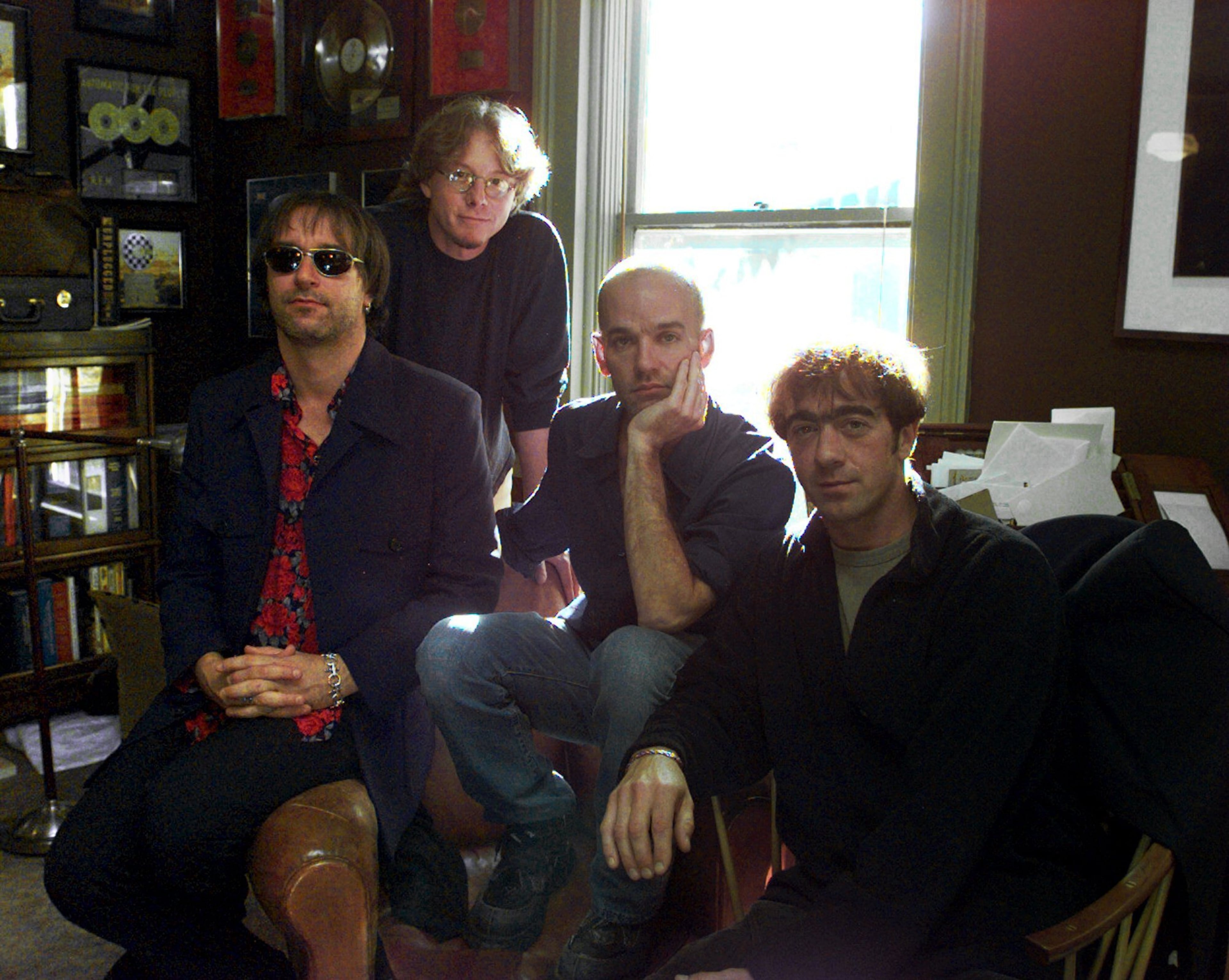 Peter Buck (from left), Mike Mills, Michael Stipe and Bill Berry formed R.E.M. in 1980 in Athens while they were students at the University of Georgia. (AJC File)