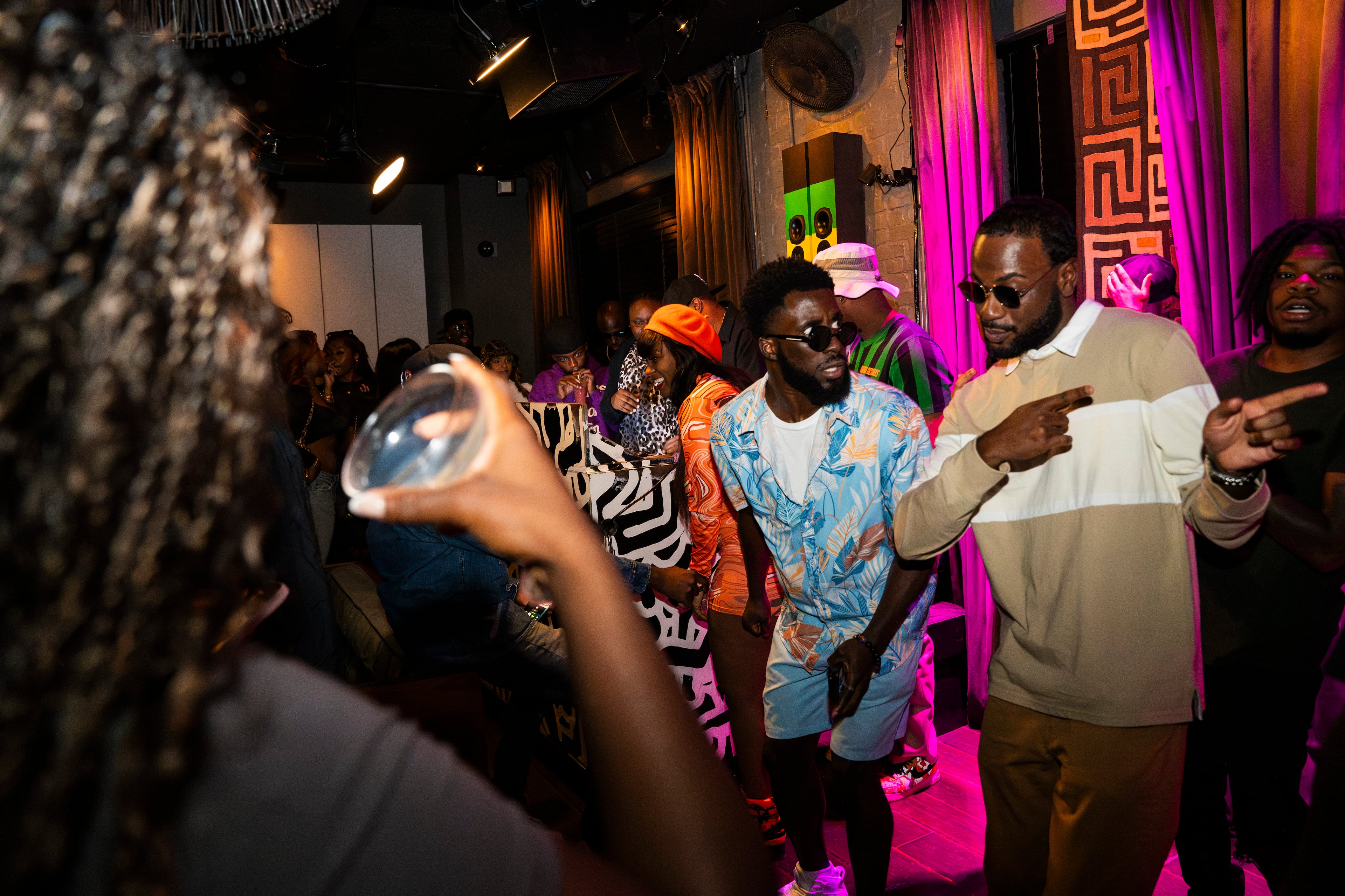 Partygoers dance and enjoy the local scene at Bamba Tuesdays, a premier amapiano dance party hosted by DJ Kash, on Tuesday, Oct. 15, 2024, in Atlanta. (Olivia Bowdoin for the AJC)