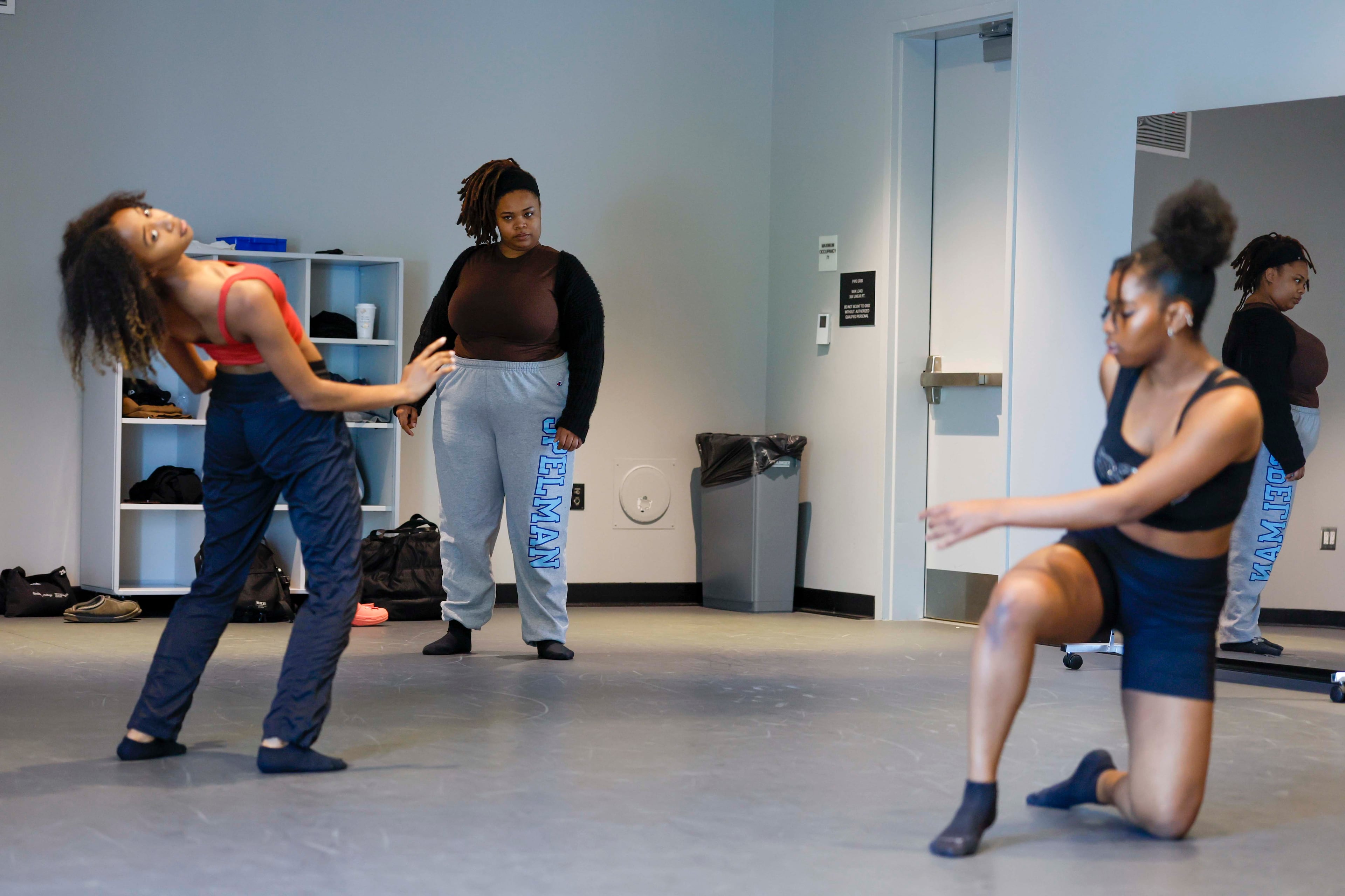 Jamilan Boston, center, a fellow under Associate Professor T. Lang, is leading a rehearsal with Spelman College students Zöe Azille, on the right, and Zoe Shepard at the Center of Innovation and Arts on Thursday, April 2, 2026. Students from T. Lang’s dance class at Spelman are preparing for a performance inspired by a’driane nieves’ artwork “Unbound Narratives” at Atlanta Contemporary, exploring how the visual art connects with Black women. (Miguel Martinez/AJC)