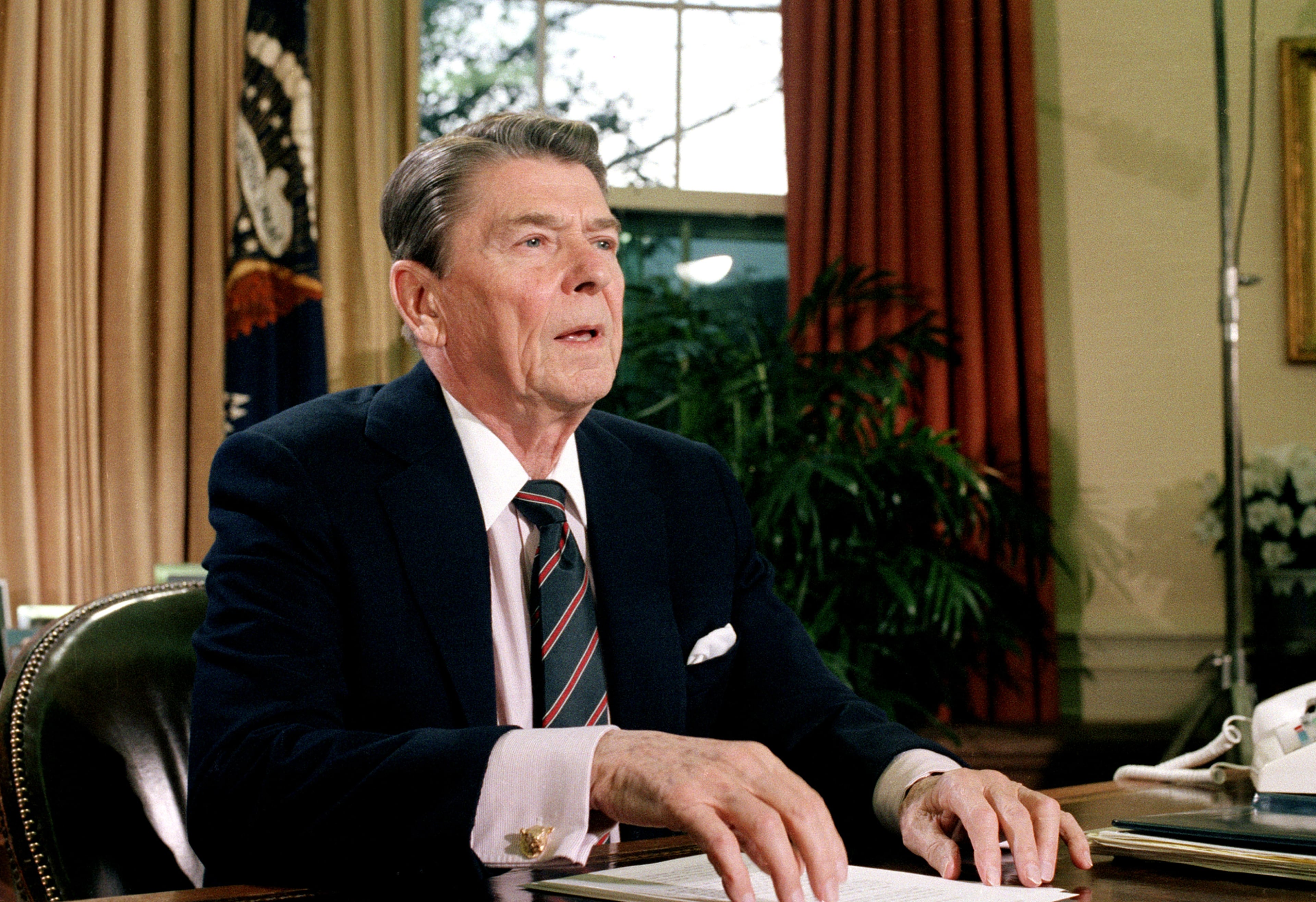 President Ronald Reagan in the Oval Office of the White House after a televised address to the nation about the space shuttle Challenger explosion. (Dennis Cook/AP 1986)