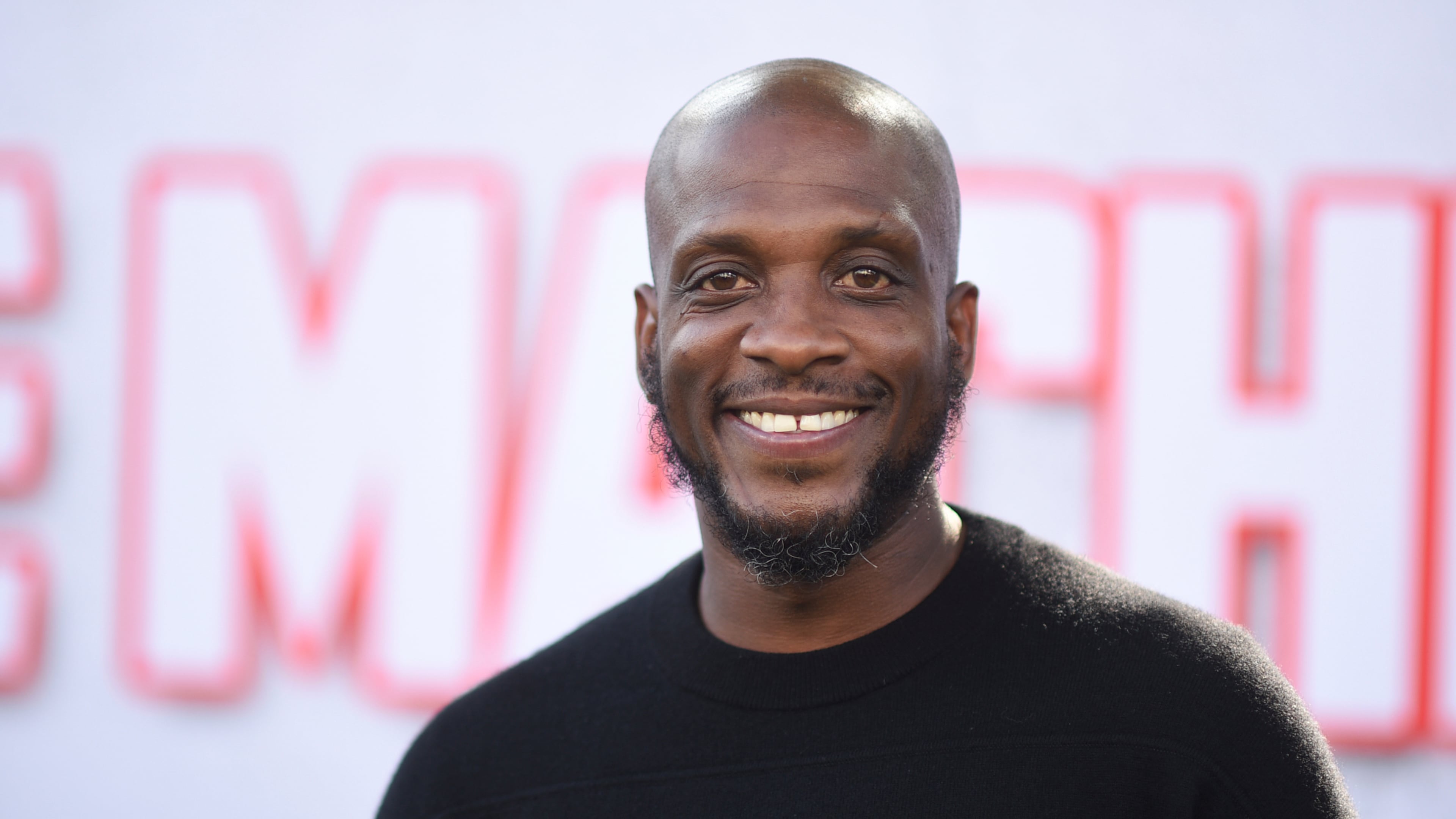 Ali Siddiq arrives at a special screening of "The Machine" at the Regency Village Theatre in Los Angeles. He got his start doing comedy while in prison. (Richard Shotwell/Invision/AP 2023)