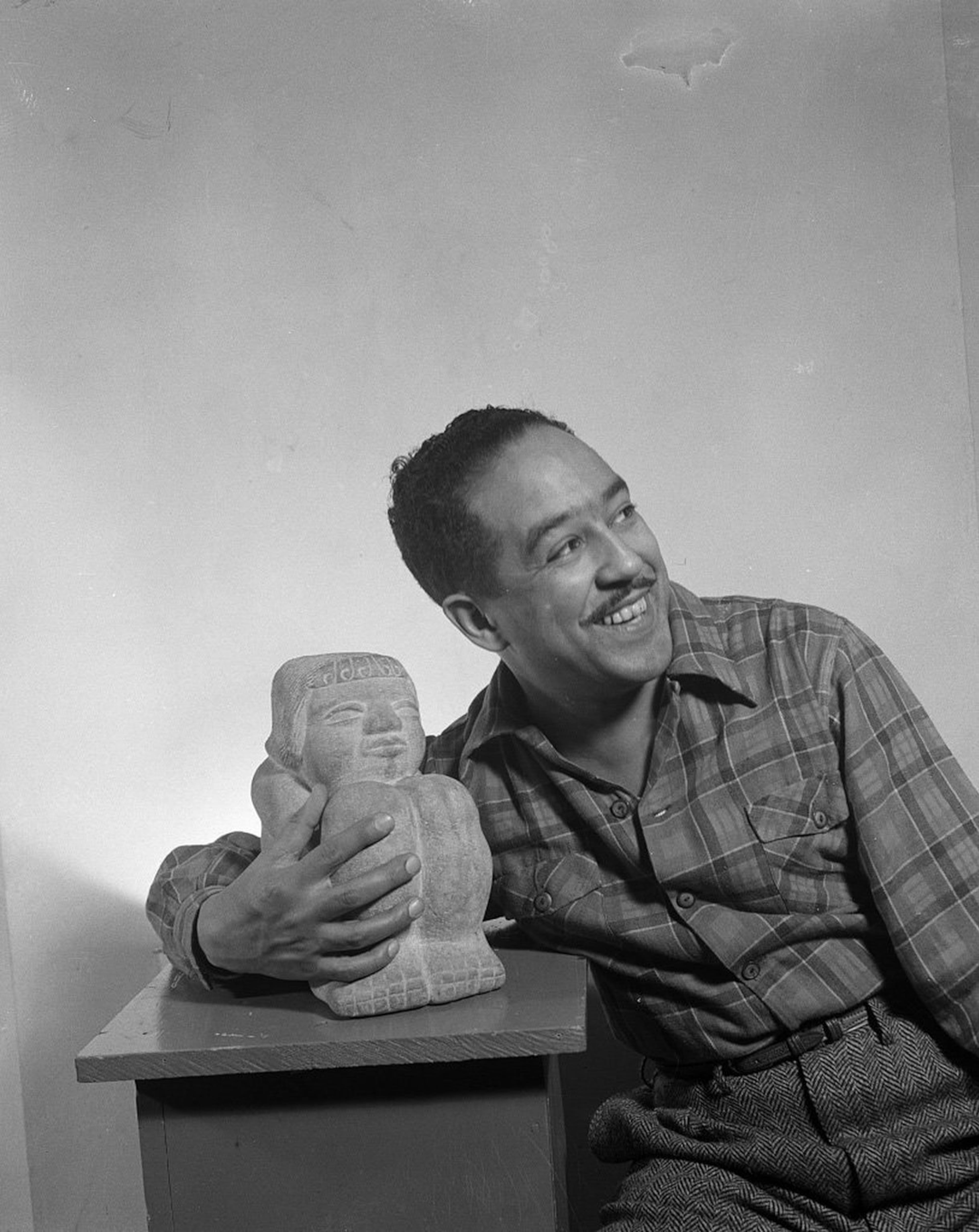 This 1943 portrait of Langston Hughes was shot by Gordon Parks. Between the height of the Harlem Renaissance in 1926 and the dawn of the Black Arts Movement in 1967, Hughes wrote 16 books of poetry and more than a dozen works of nonfiction and children’s books. (Courtesy of the Library of Congress)
