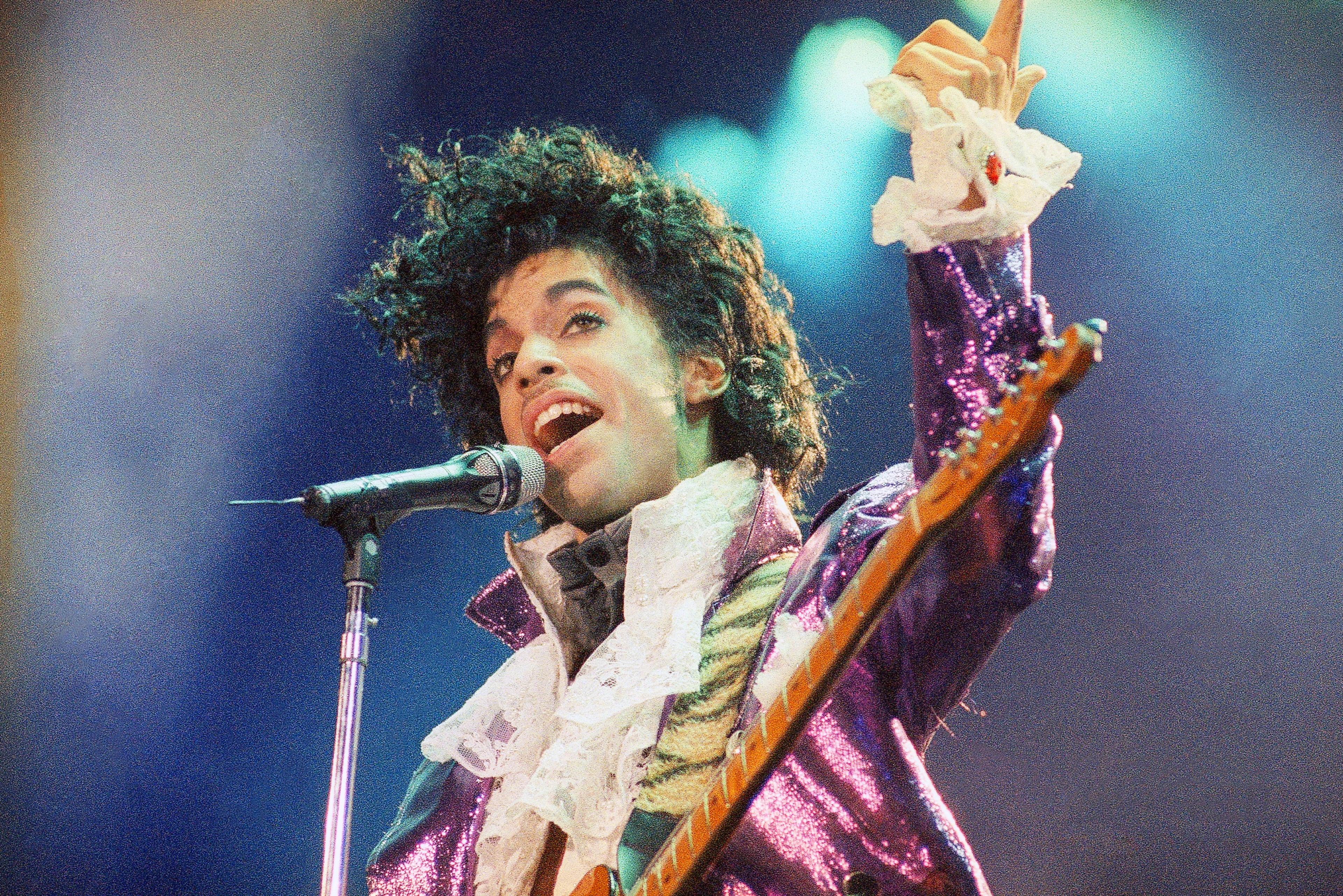 Prince performs at the Forum in Inglewood, Calif., on Feb. 18, 1985. (Liu Heung Shing/AP 1985)