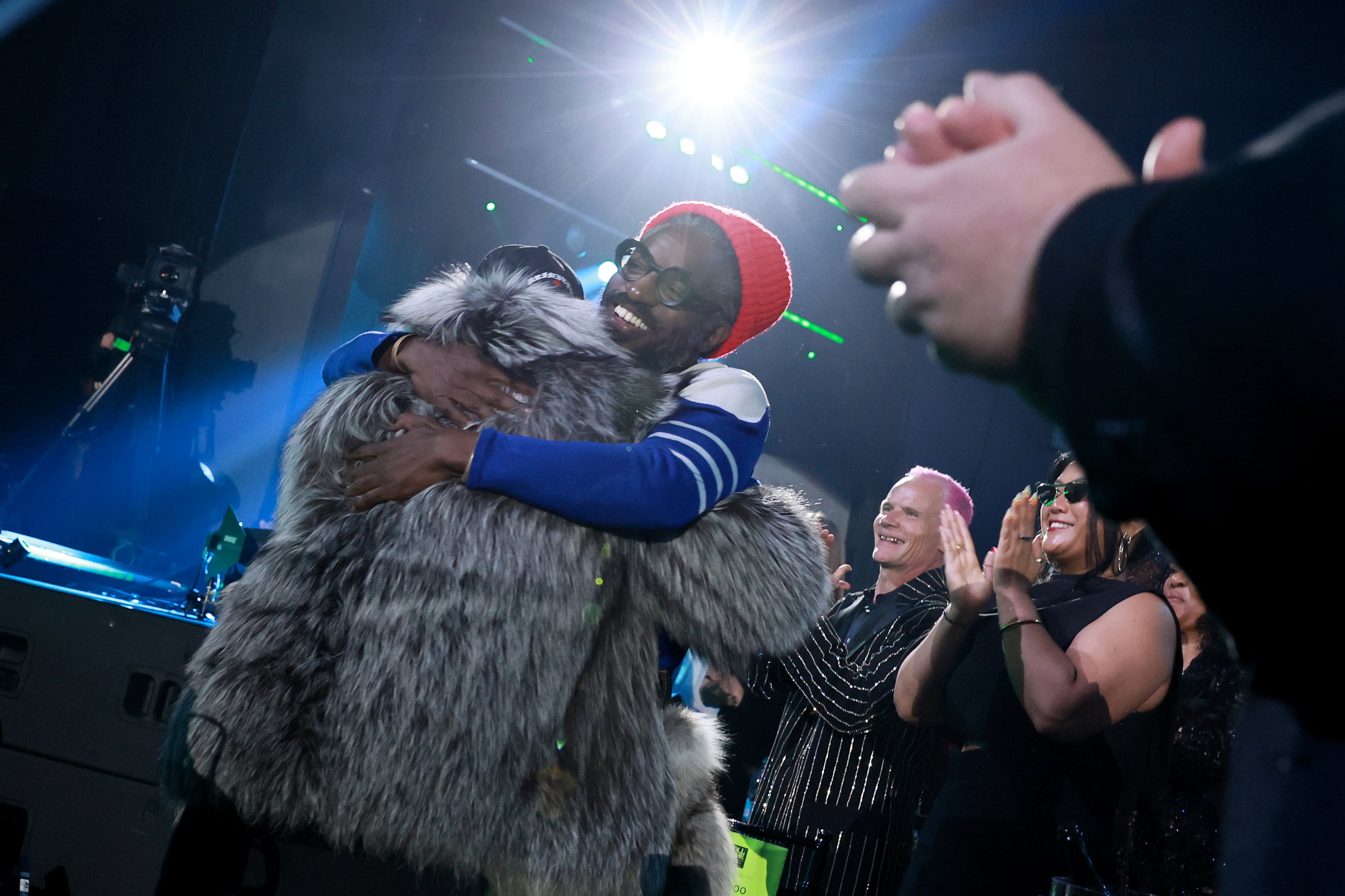 Inductees Big Boi and André 3000 of Outkast hug before going onstage during the 2025 Rock & Roll Hall of Fame Induction Ceremony at Peacock Theater on November 08, 2025 in Los Angeles, California. (Photo by Theo Wargo/Getty Images for RRHOF)