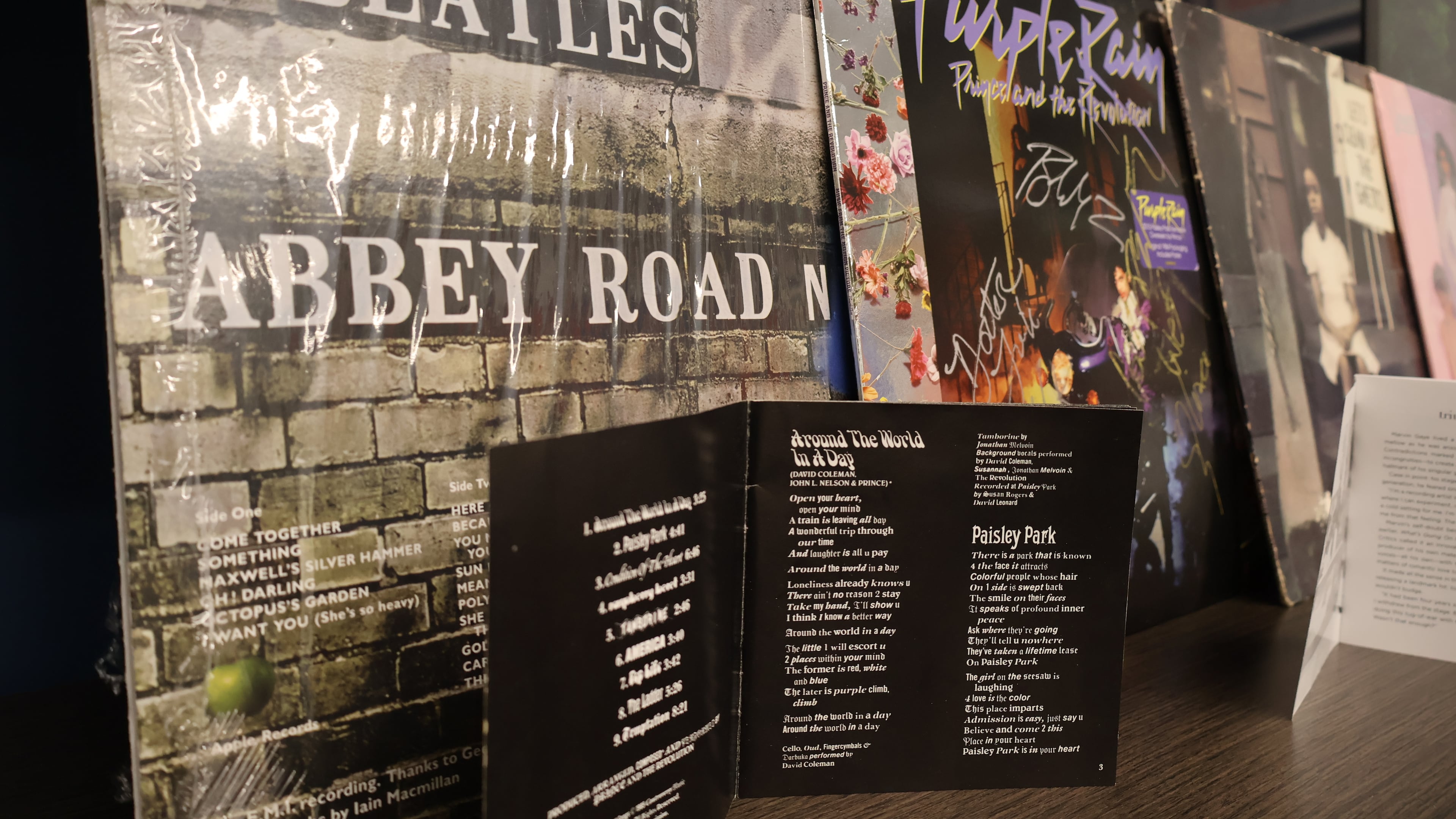 Album covers and liner notes for The Beatles' "Abbey Road," Prince and the Revolution's "Around the World in a Day," and "Purple Rain," The Philadelphia International All Stars' "Let's Clean Up the Ghetto," Marvin Gaye's "What's Going On Live" and Vanity 6 are featured in UATL Black culture reporter Christopher A. Daniel's music collection. (Courtesy of Kevin Pernell)