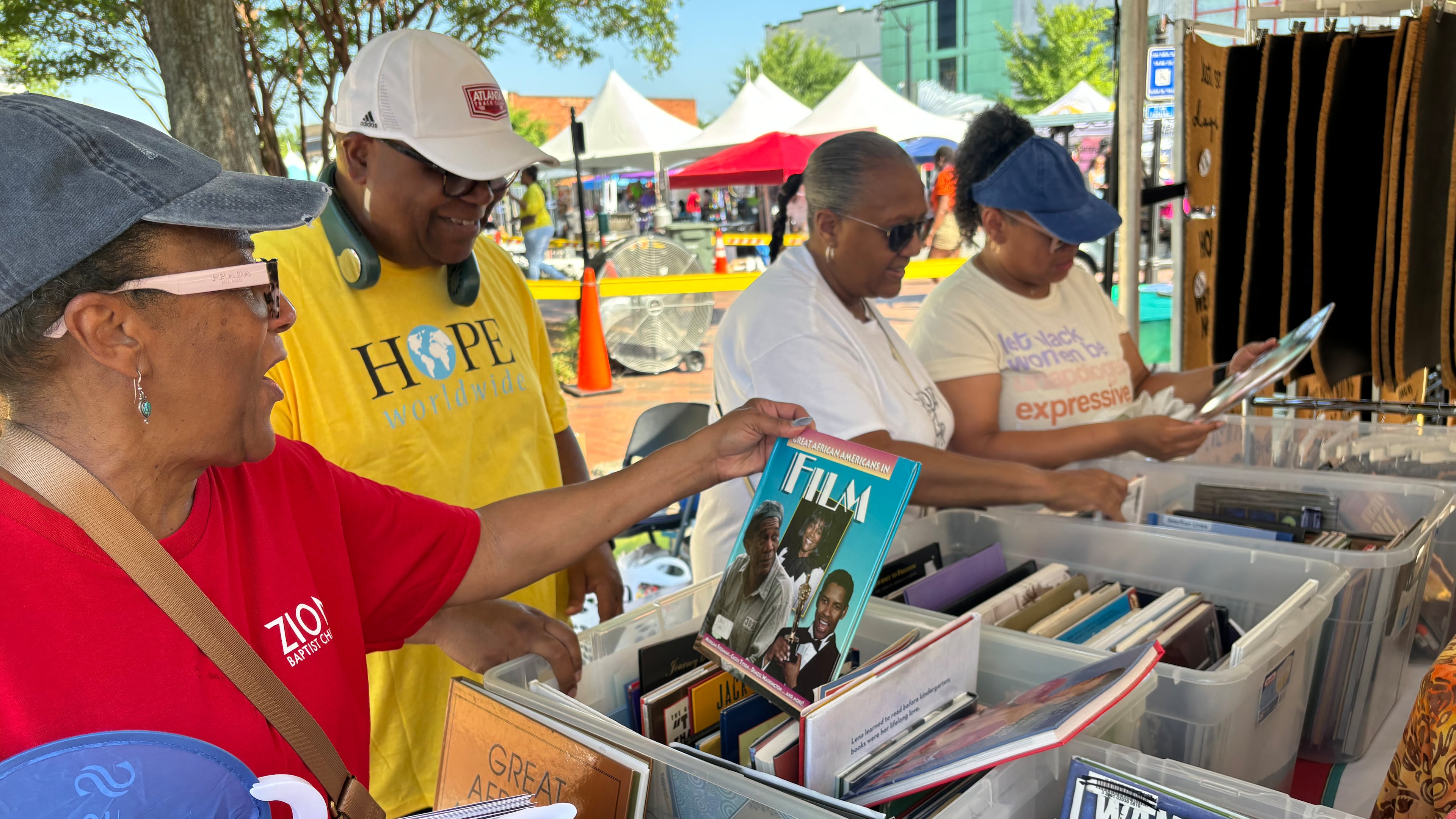 North River Church Hope Worldwide gave away 2,000 books on Black history in 2024 during a Juneteenth celebration in Marietta Square. The books were donated by Books For Africa in Marietta. (Courtesy of North River Hope Worldwide 2024)
