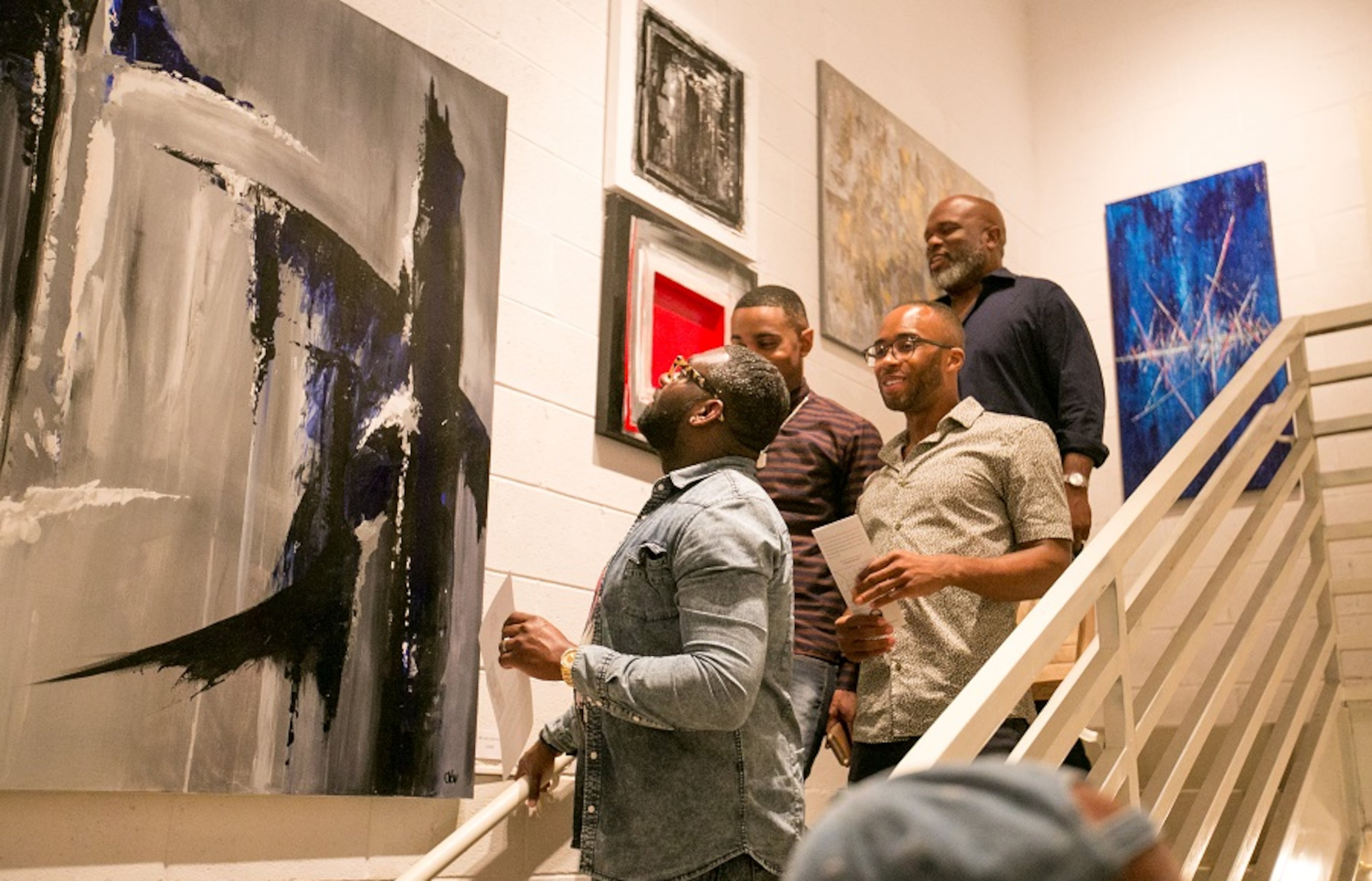 In this 2020 file photo, Orlando Vargas' work is on display at Escape Gallery, a space that extends the length of a stairwell during an artist walk in Castleberry. (AJC file)