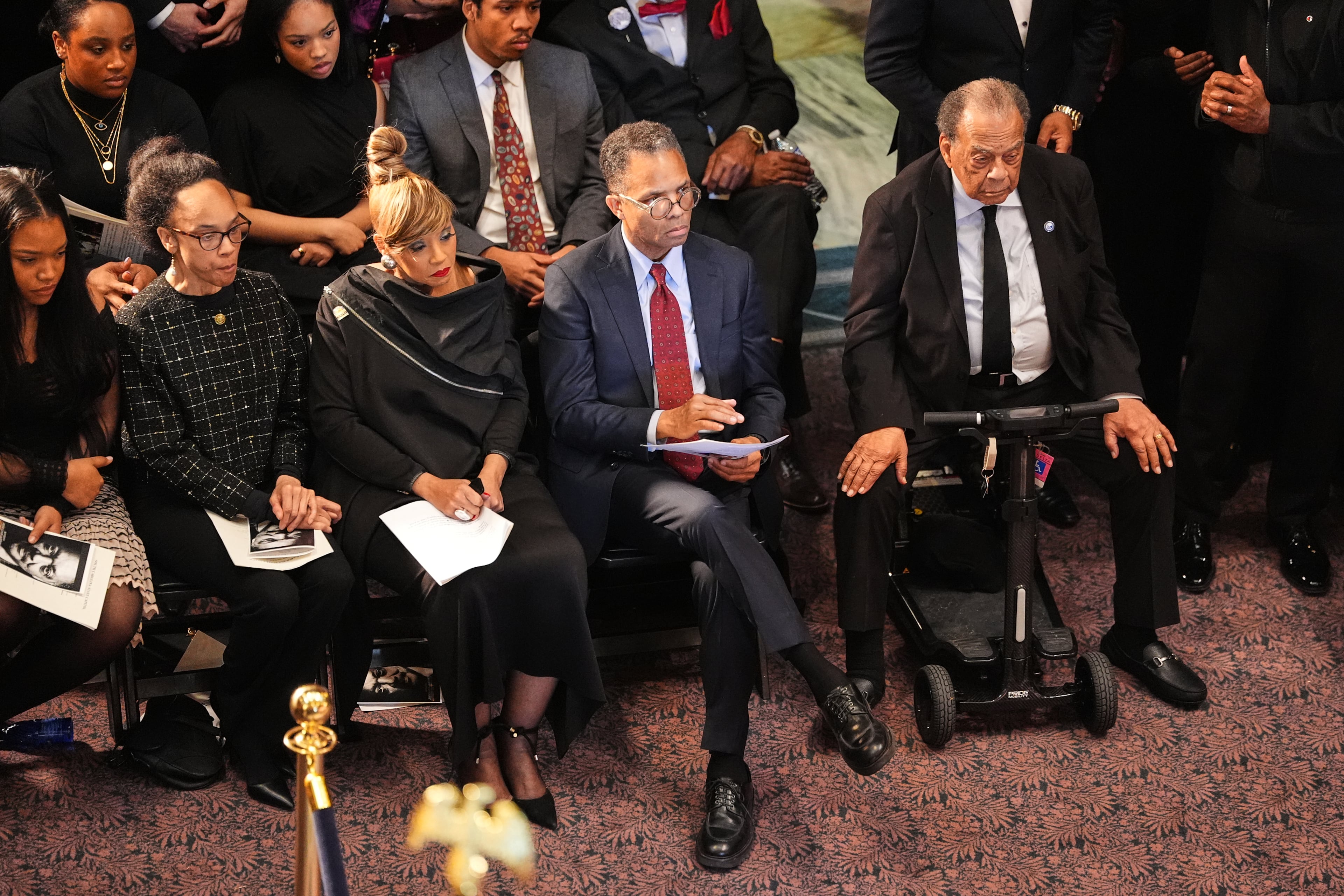 Andrew Young (from right) joined Jesse Jackson Jr., Santita Jackson and others inside the South Carolina Statehouse as the Rev. Jesse Jackson lies in state. (Matt Kelley, Pool/AP)