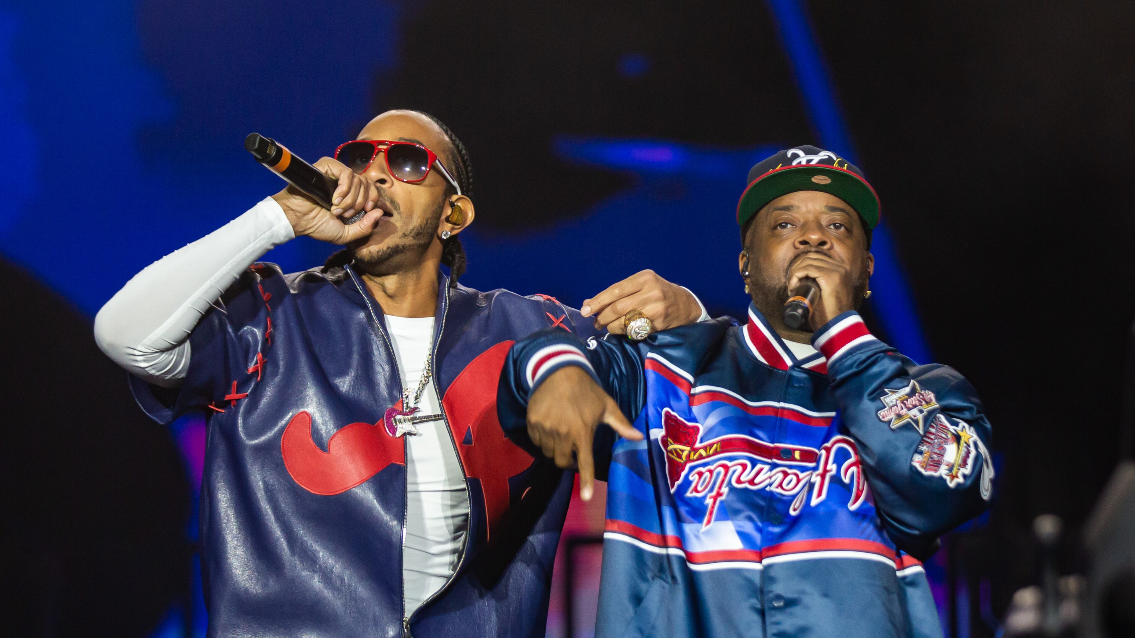 Celebrating 25 years since his major label debut, Ludacris (left) closes out One Musicfest on Sunday, Oct. 26, 2025, with an array of special guests, including LL Cool J, Usher, Fergie, Jadakiss, Shawna, Jeezy, Chingy and Jermaine Dupri (right). (Ryan Fleisher for the AJC)
