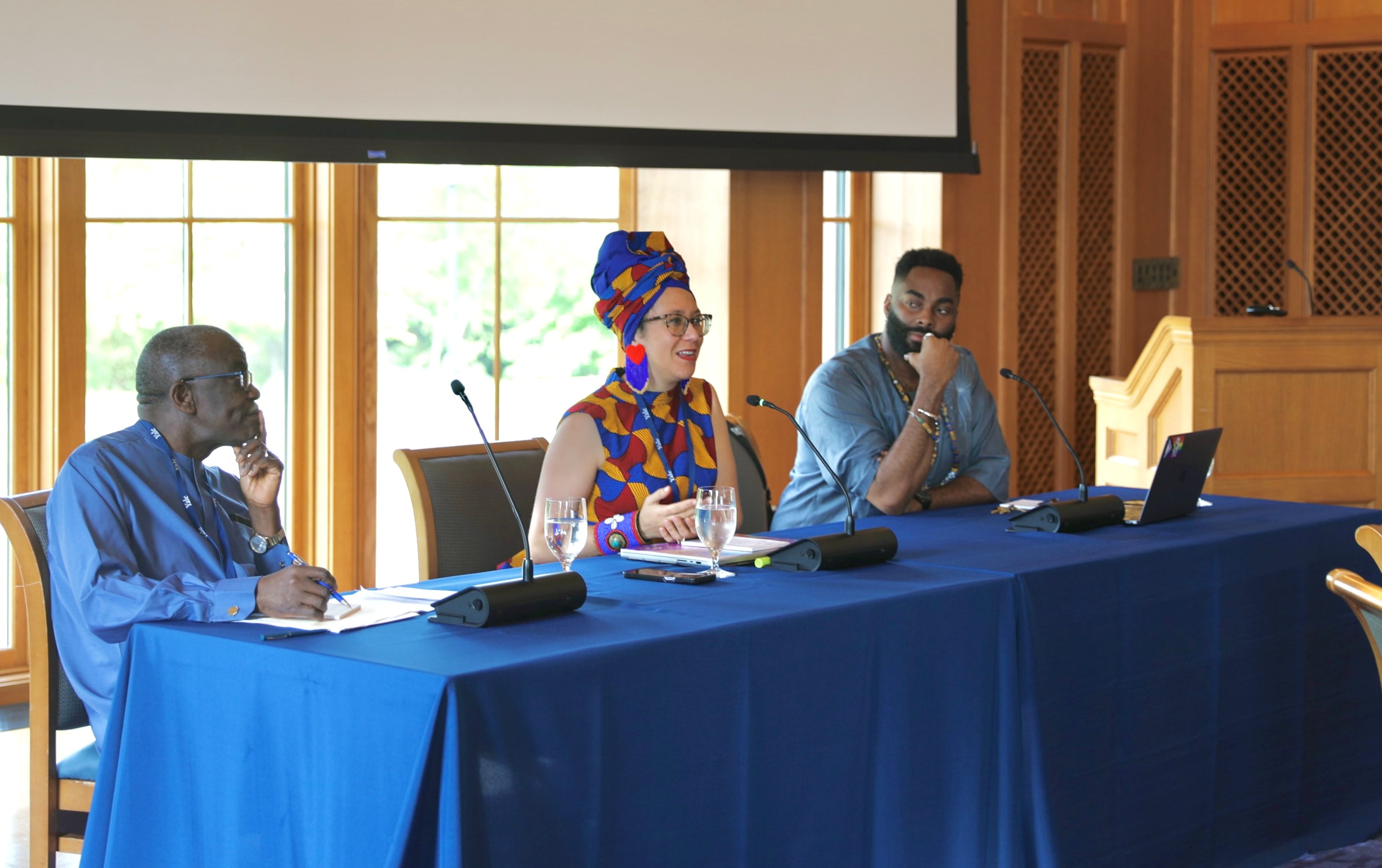 From L-R: Keynote speakers Dr. Jacob K. Olupona (Harvard University) and Manbo Dr. Kyrah Malika Daniels (Emory University) and event organizer Houngan Collin Édouard (Yale University). (Courtesy of Amanda Patrick/Yale University)