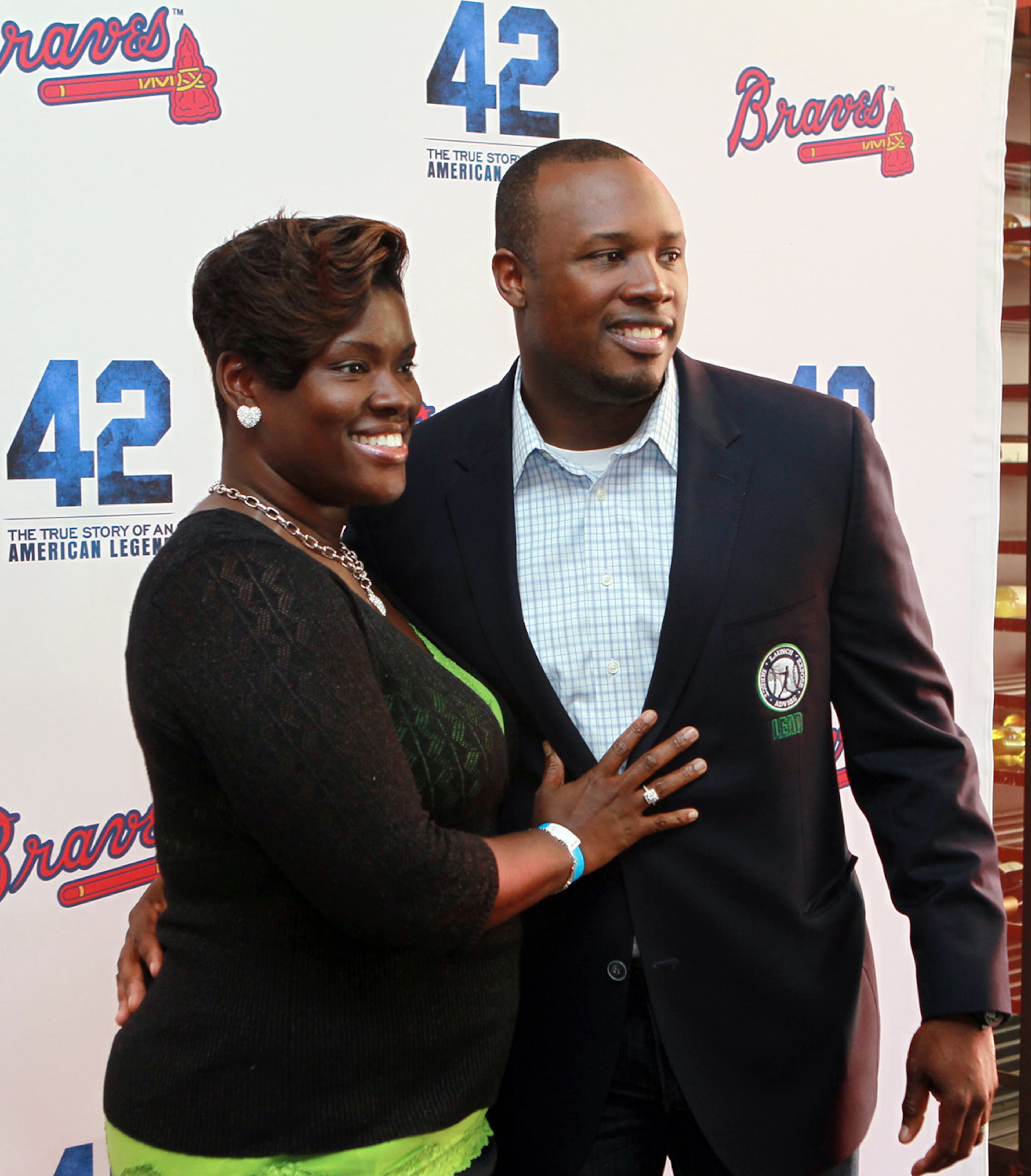 Former Chicago Cubs outfielder C.J. Stewart, with his wife Kelli, attends a private screening of "42" at Regal Cinema 16 in Atlantic Station in Atlanta. (Phil Skinner/AJC file photo)