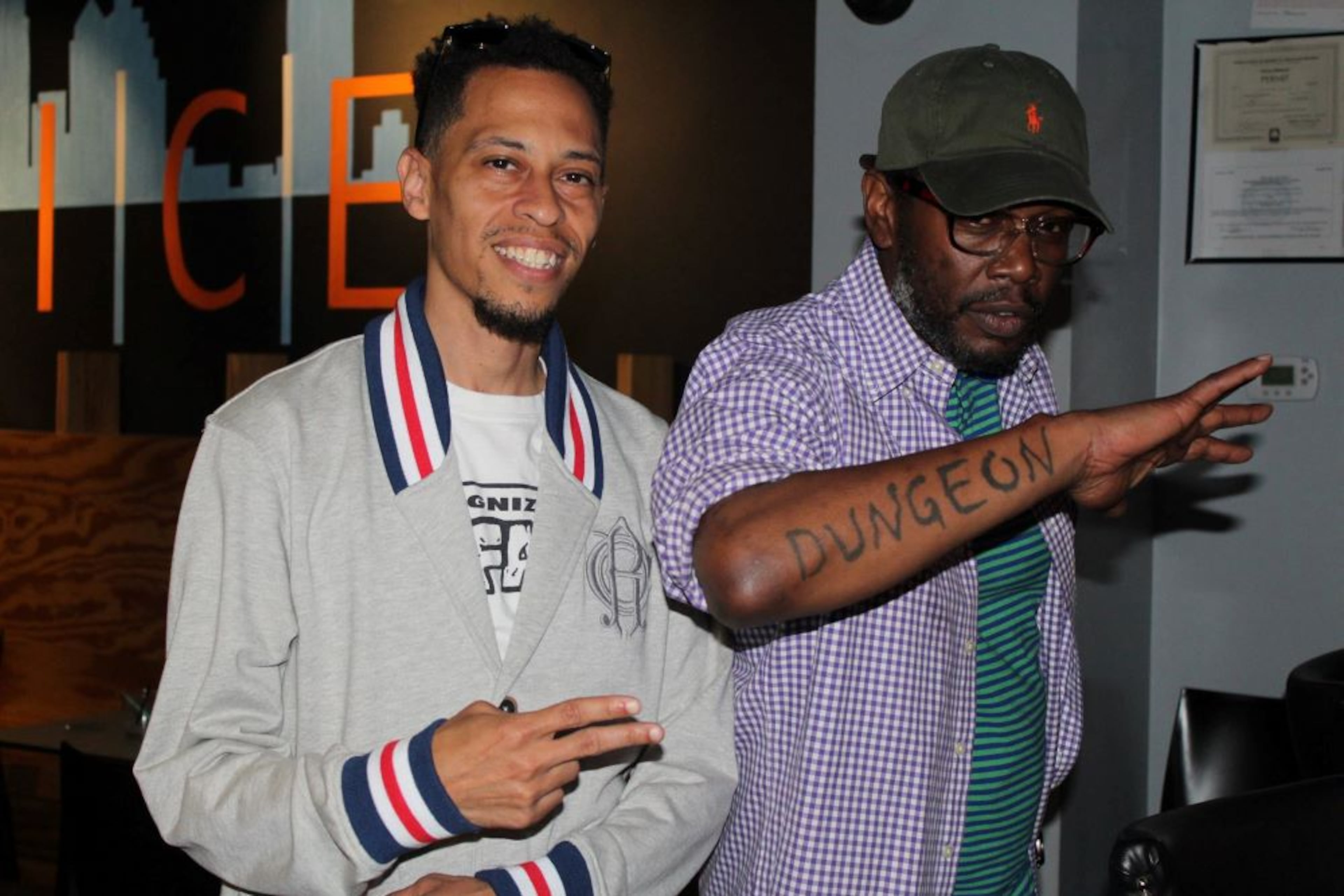 Hip-hop memorabilia collector Larry 'Nuface' Compton and Dungeon Family member Backbone attend Hip Hop Trivia ATL. (Courtesy of Facts Only Trivia)