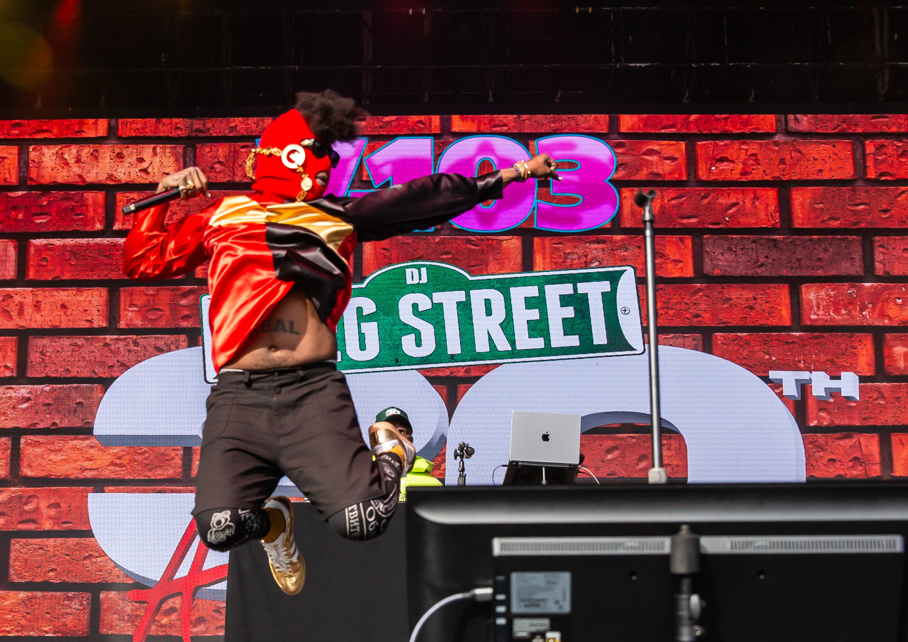 Atlanta rapper Trinidad James took the stage first for Greg Street's all-star set on Saturday Oct. 25, 2025, at Piedmont Park in Atlanta. (Ryan Fleisher for the AJC)