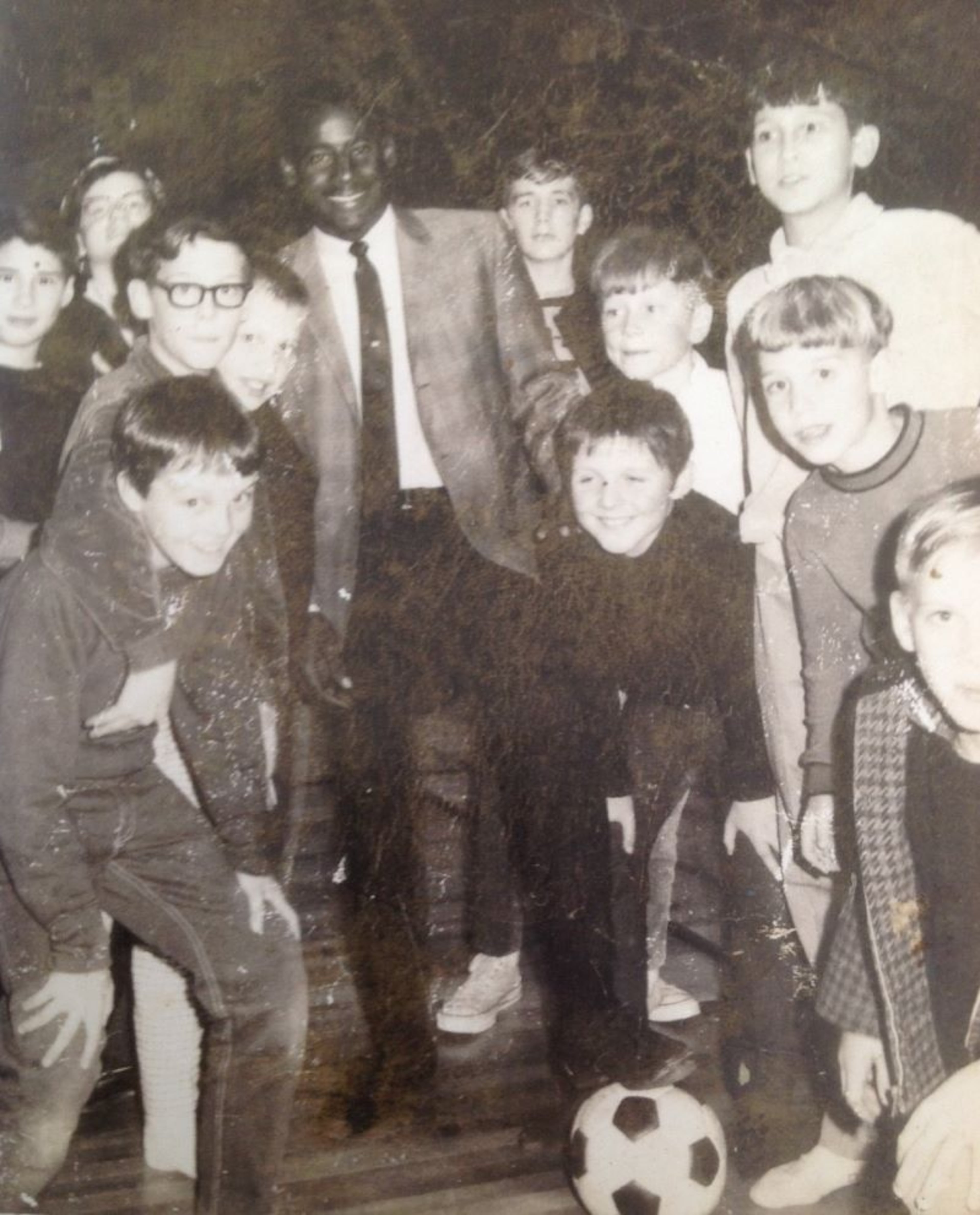 Atlanta Chiefs midfielder Everald Cummings poses with local Atlanta youth at YMCA in 1968. (Courtesy of Everald Cummings)