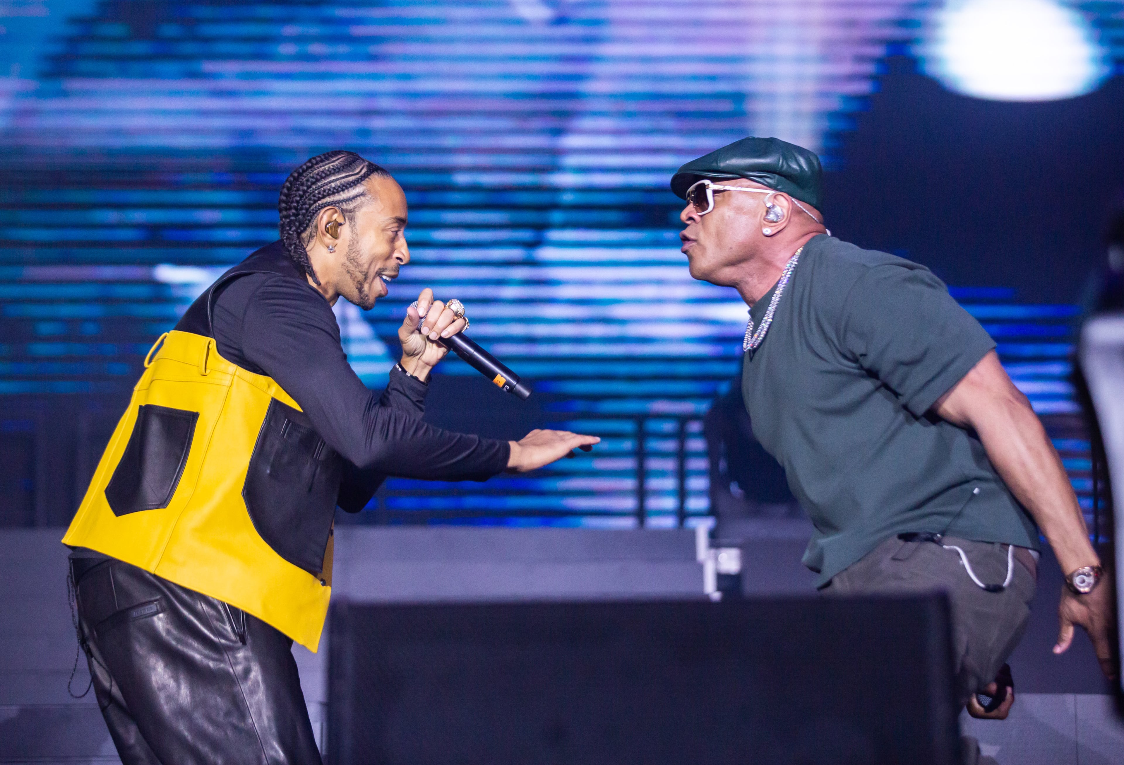 Ludacris (left) closes out One Musicfest on Sunday, Oct. 26, 2025, with an array of special guests that included LL Cool J, who Ludacris says is one of the reasons he started rapping. (Ryan Fleisher for the AJC)