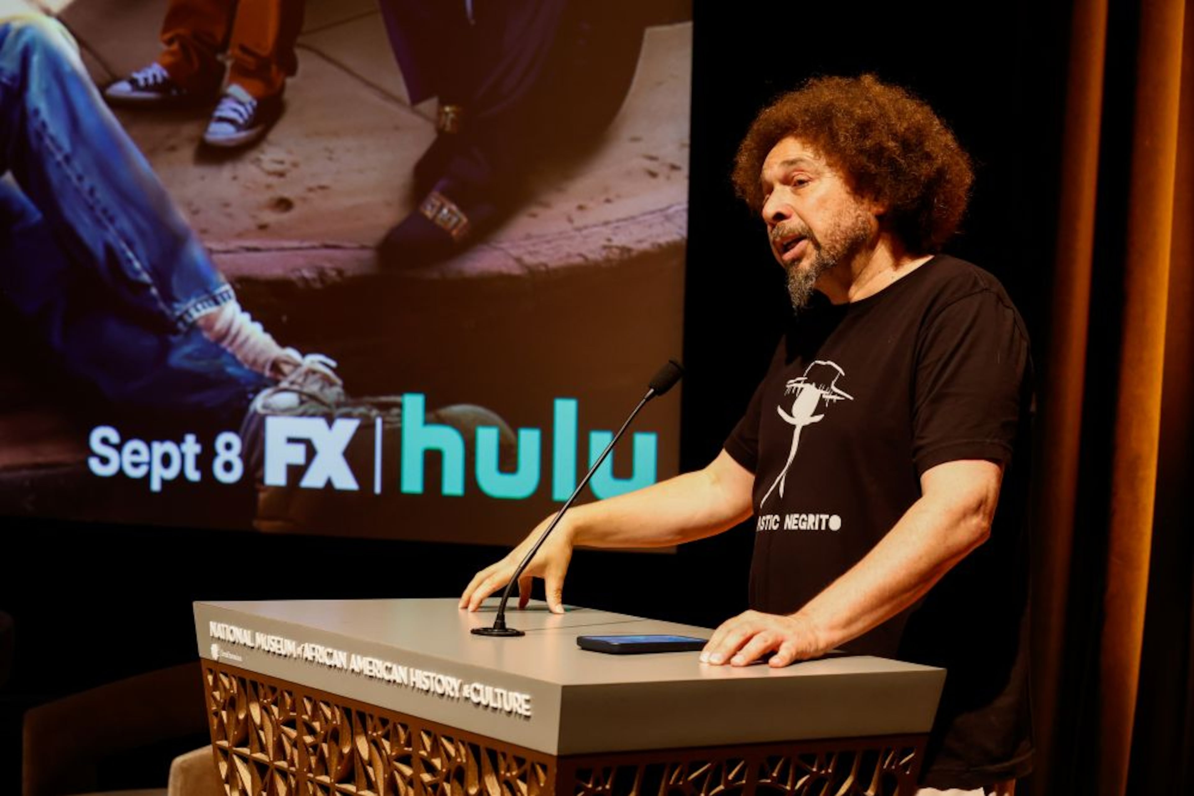 Series creator, executive producer and showrunner of 'The Drop: A Snowfall Saga' Malcolm Spellman speaks during a red carpet launch event at the National Museum of African American History and Culture in Washington, D.C. on Sept. 1, 2026 (Courtesy of Paul Morigi/PictureGroup for FX).