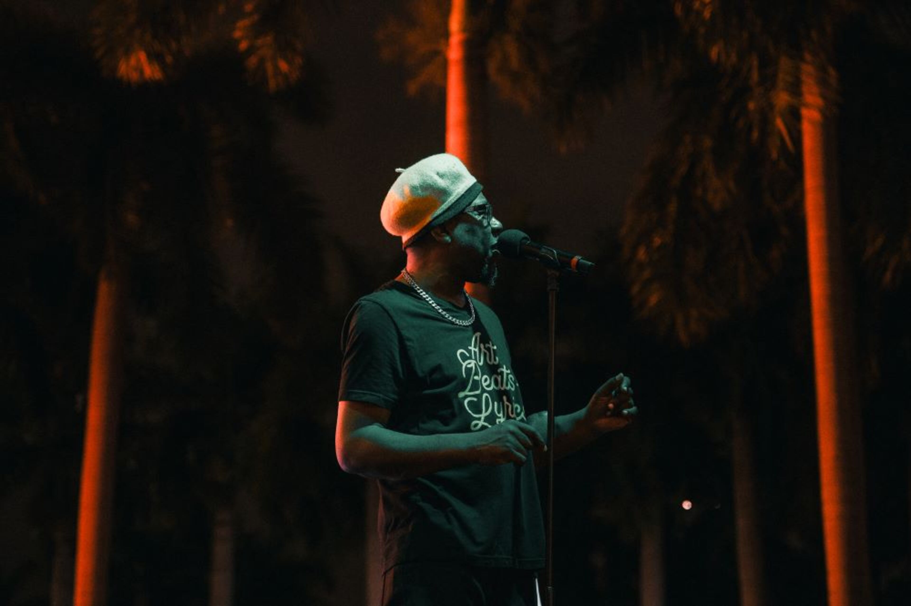 D.R.E.S. Tha Beatnik hosts Arts Beats + Lyrics in Miami in 2023. D.R.E.S. also created events, including The Mighty Mighty Beat Down and The World Famous Mic Club. (Courtesy of Kat Goduco)