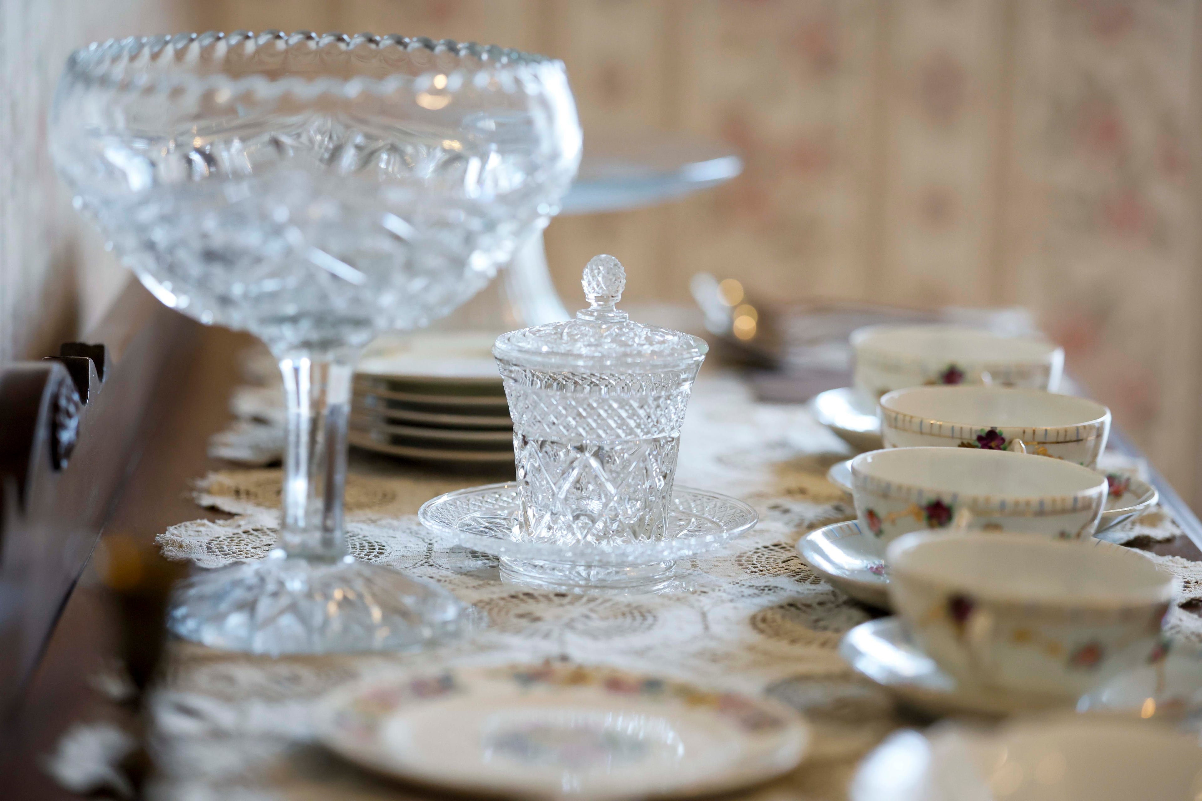 Crystal glasses and a sugar container in the newly renovated dining room of Martin Luther King Jr.'s childhood home. (Miguel Martinez/AJC)