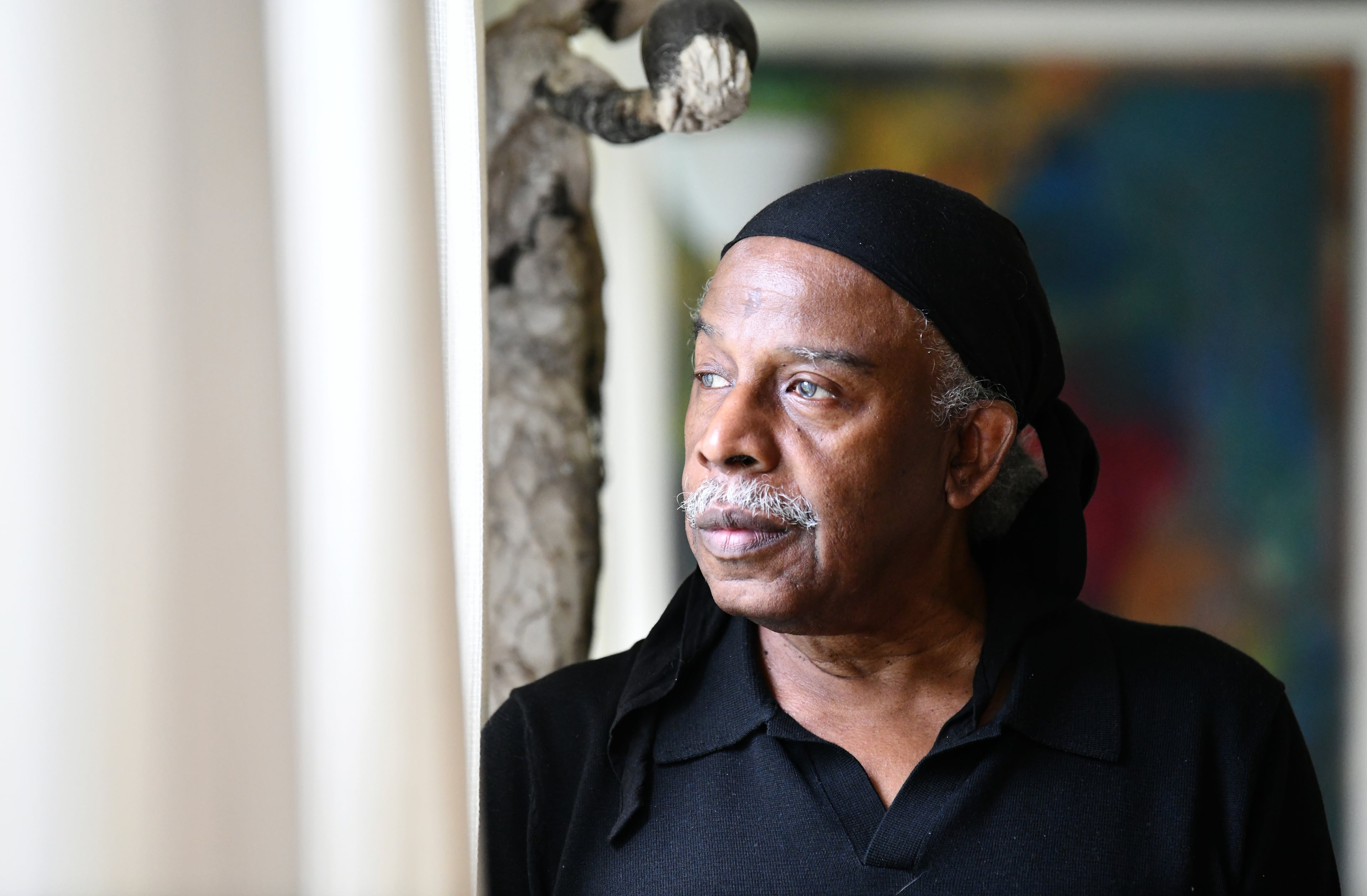 Portrait of Freddie Styles at the home of his longtime friend and fellow artist Carl Christian, July 10, 2025. Styles home and artwork were destroyed by fire. (Hyosub Shin/AJC)