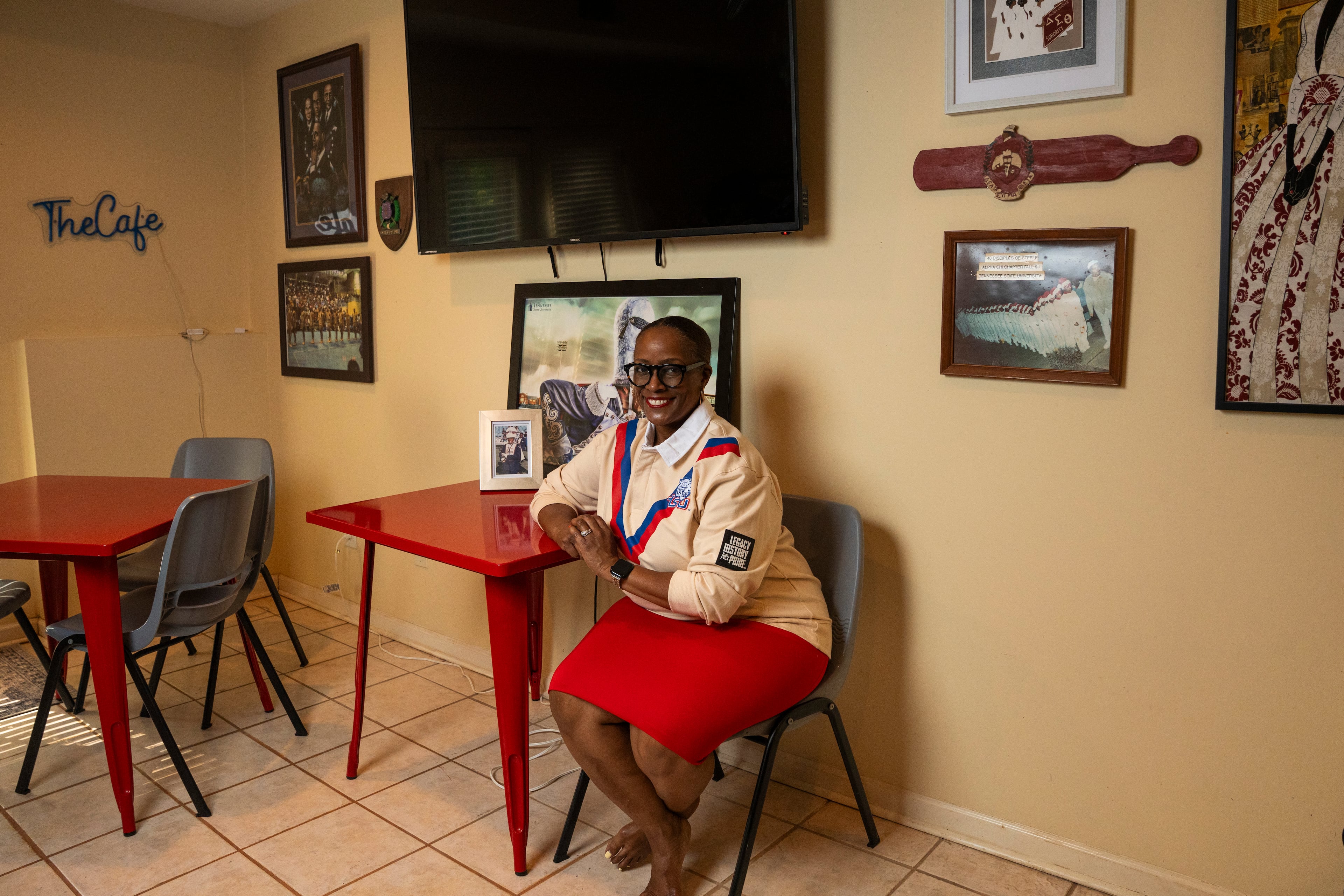 Photographs of the Tennessee State University Aristocrat of Bands and Egeston's 1991 sorority line fill the walls of the room she built at her Stone Mountain home. (Olivia Bowdoin for the AJC)