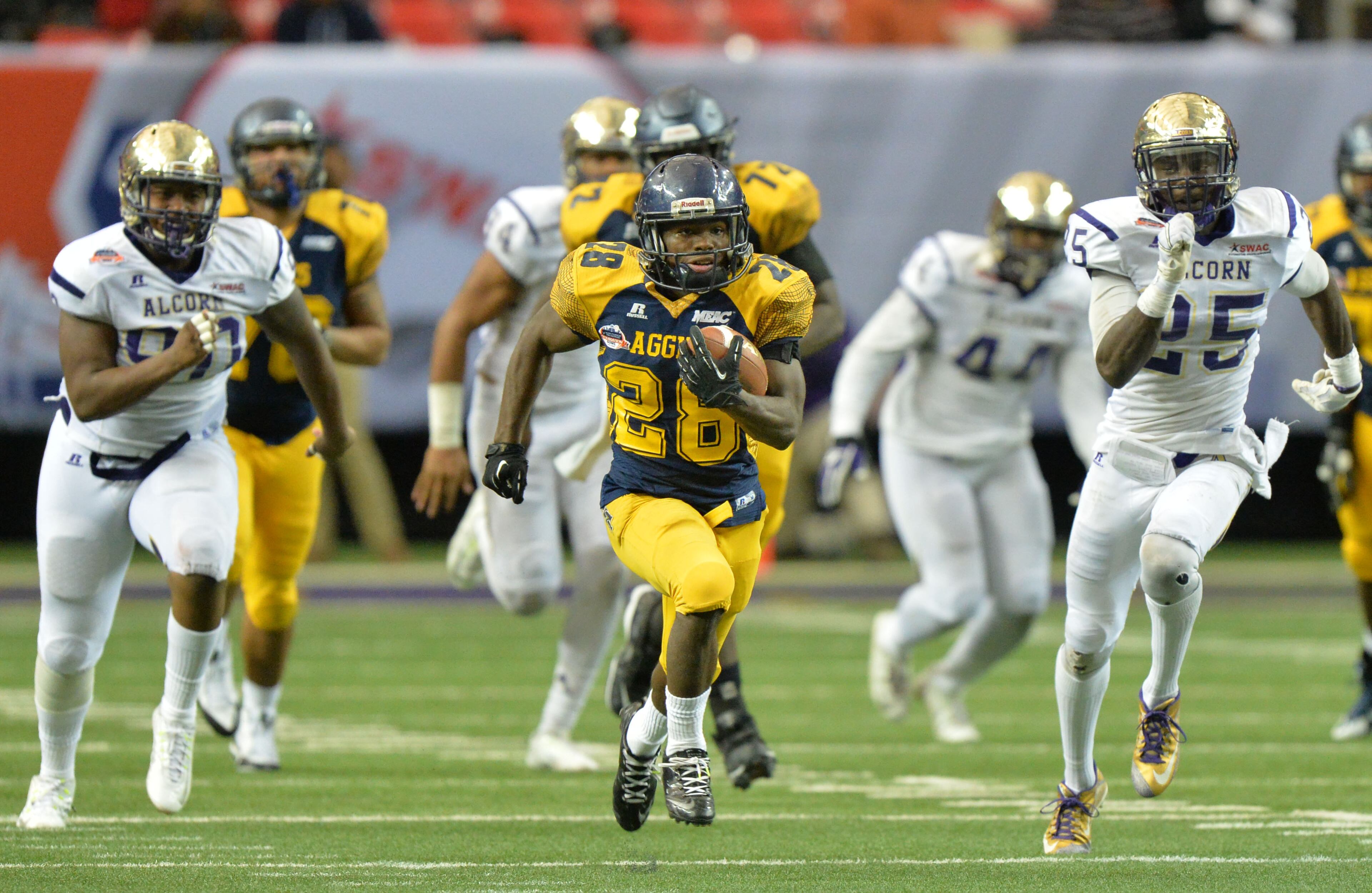 The Celebration Bowl began in 2015, when Tarik Cohen (center) and North Carolina A&T beat Alcorn State 41-34 on Dec. 19, 2015, at the Georgia Dome. (Hyosub Shin/AJC 2015)
