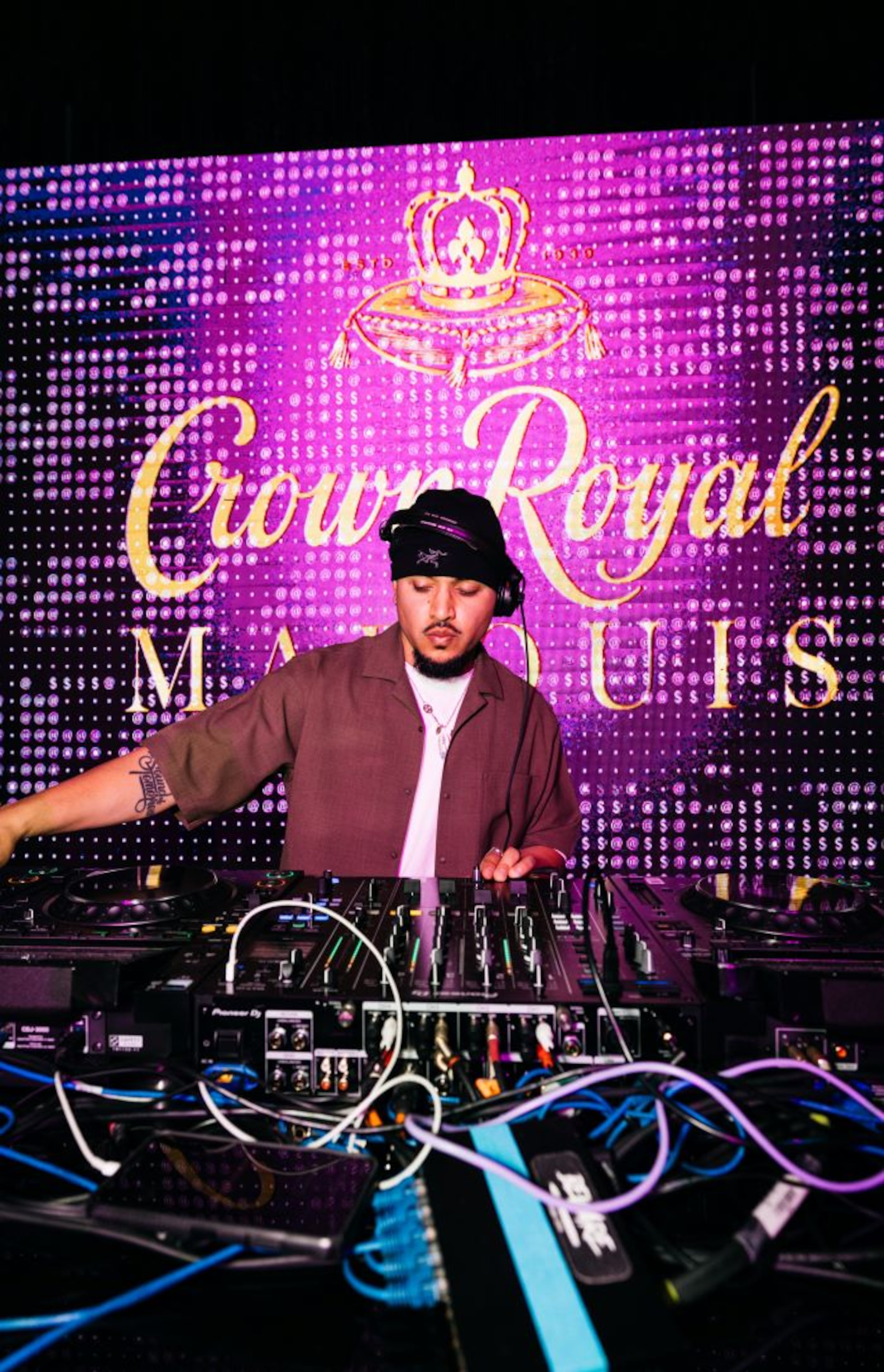 Joe Kay performs at a launch party for whiskey brand Crown Royal's rum-inspired offspring Crown Royal Marquis at Cam Kirk Studios in Atlanta on May 20, 2025. (Courtesy of Wire ATL)