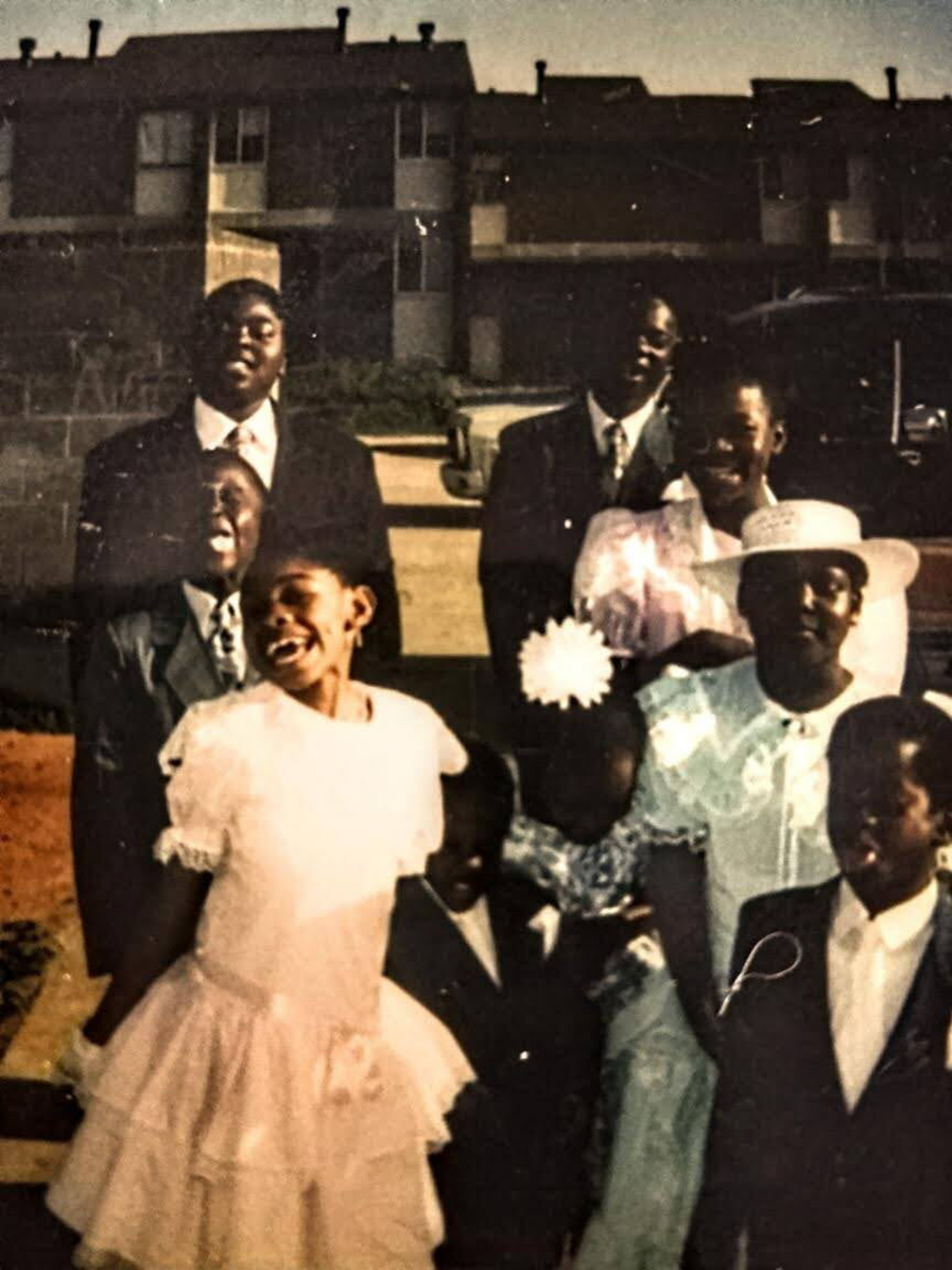Former Thomasville Heights resident Anthony Ellis-Scott poses on Easter around 1990 with family members in front of his grandmother's home on Henry Thomas Drive. (Courtesy of Anthony Ellis-Scott)