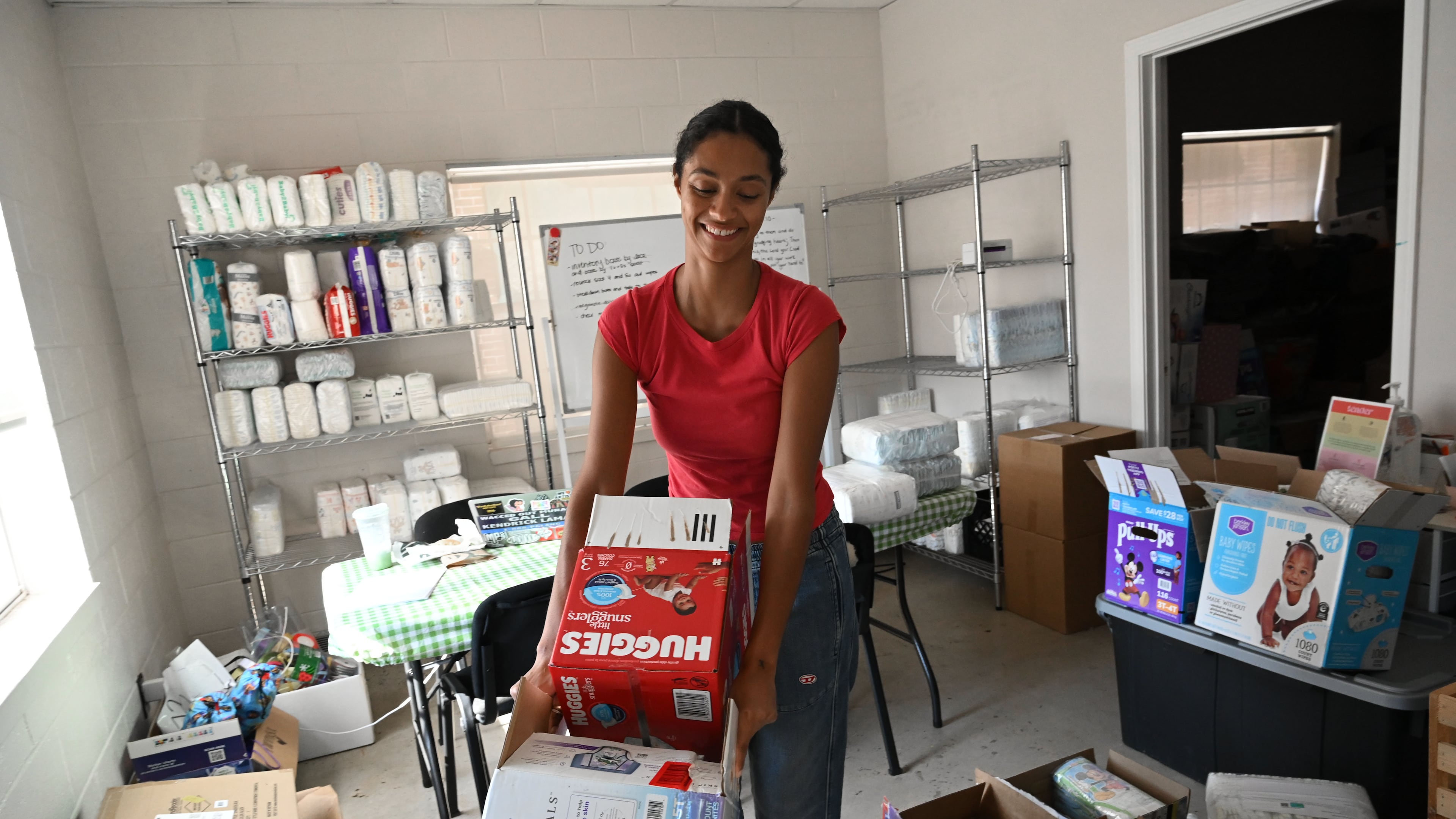 Jaycina Almond, who founded the Tender Foundation in 2020, created the idea of helping Atlanta mothers make ends meet based on her experiences as a 20-year-old new mother. (Hyosub Shin/AJC)
