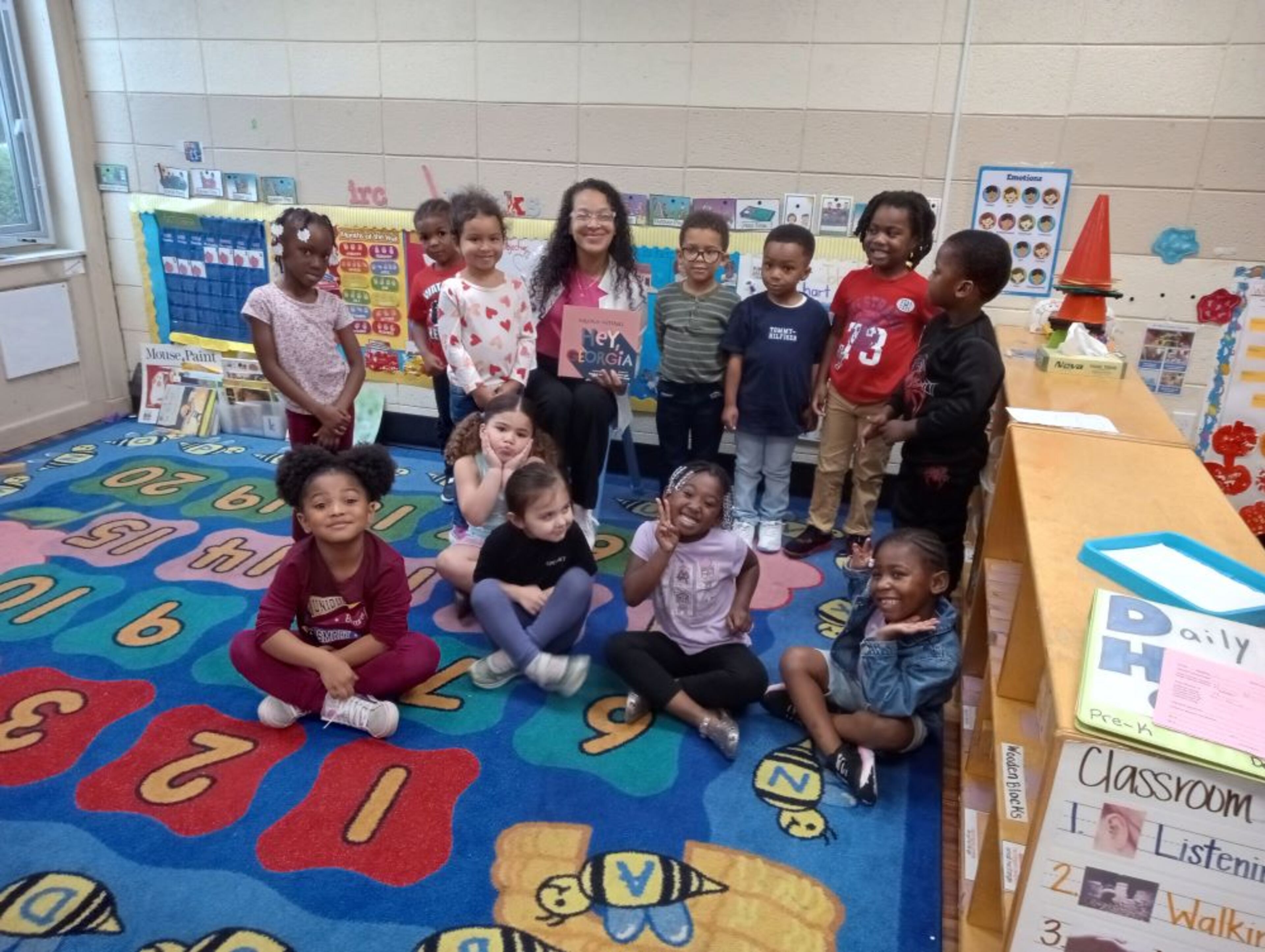 Black Child Development Atlanta president Tatjyana Elmore reads to kids at McIntosh Trail Early Childhood Development Center in Griffin, Georgia in April 2025.