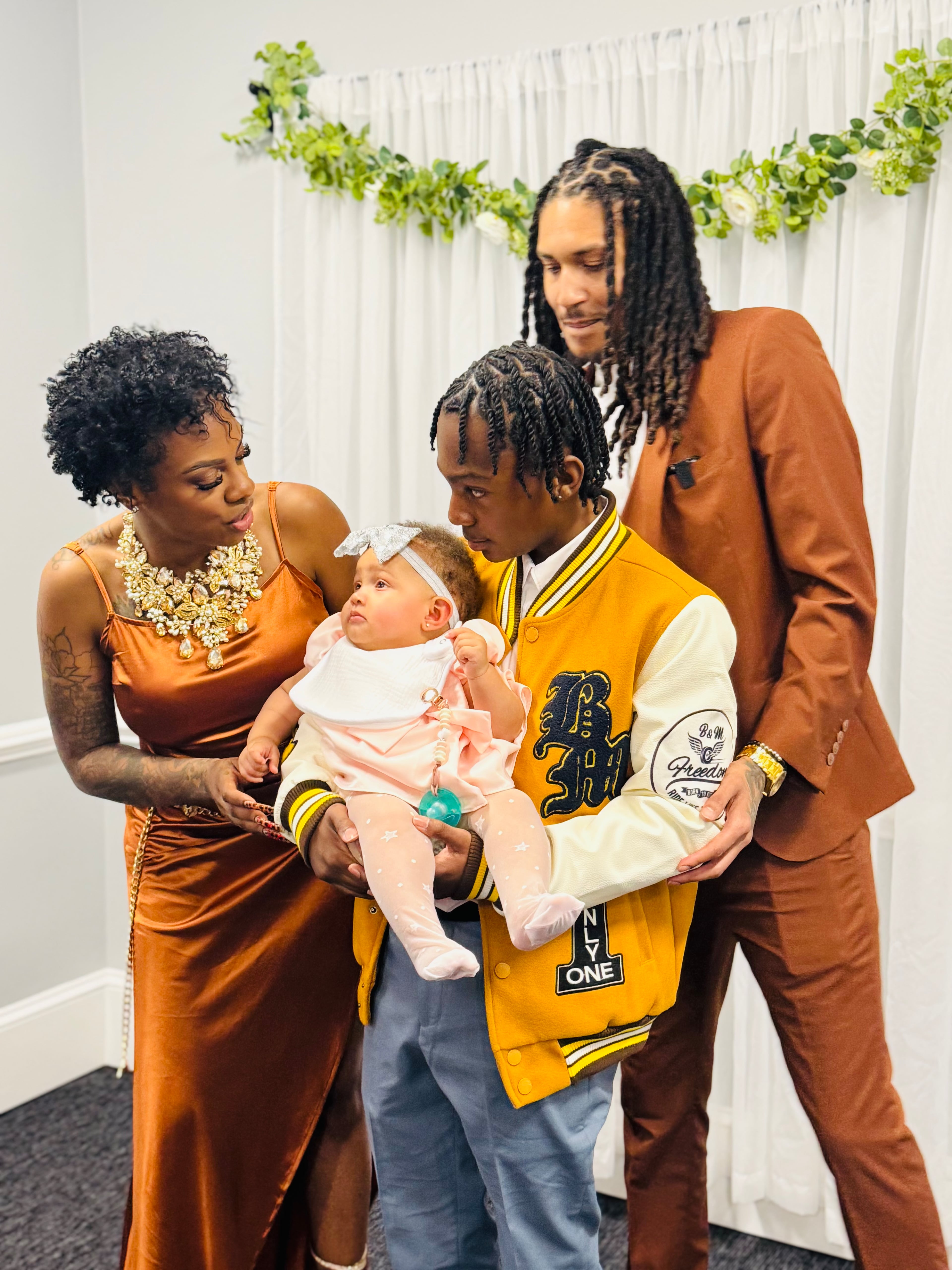 Comic and "The Breakfast Club" radio show co-host Jess Hilarious poses with her family. (From L to R: Jess, daughter Marley, son Ashton, husband Chris.) (Courtesy of Jess Hilarious)