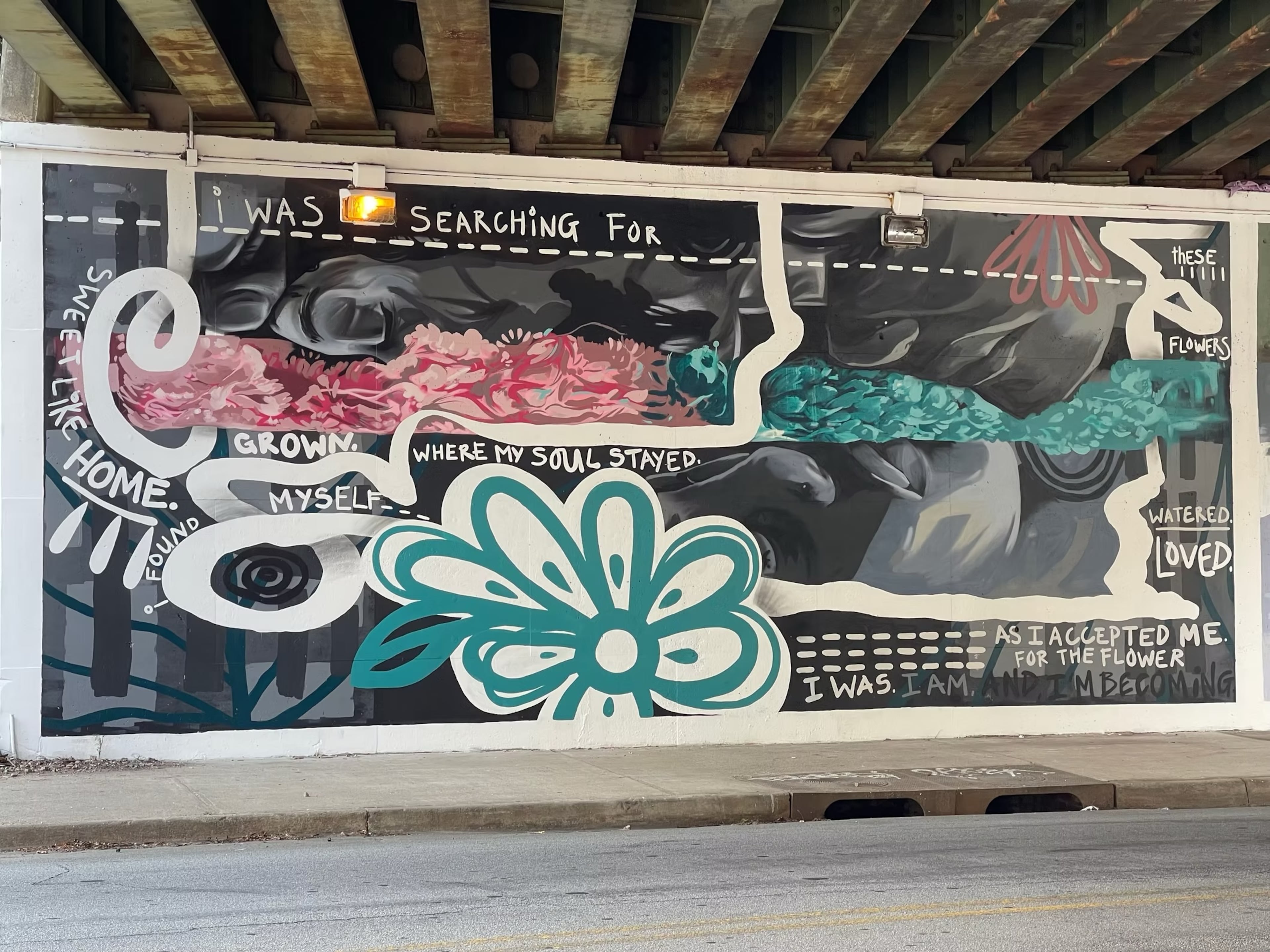 The mural on the border of Edgewood and Candler Park, "I'm the flowers I Need," is in collaboration with Living Walls ATL & Drew Borders. Charity Hamidullah is an Atlanta artist being highlighted for UATL's 404ward series, with the current focus on the performing and creative arts. (Photo by Drew Borders)