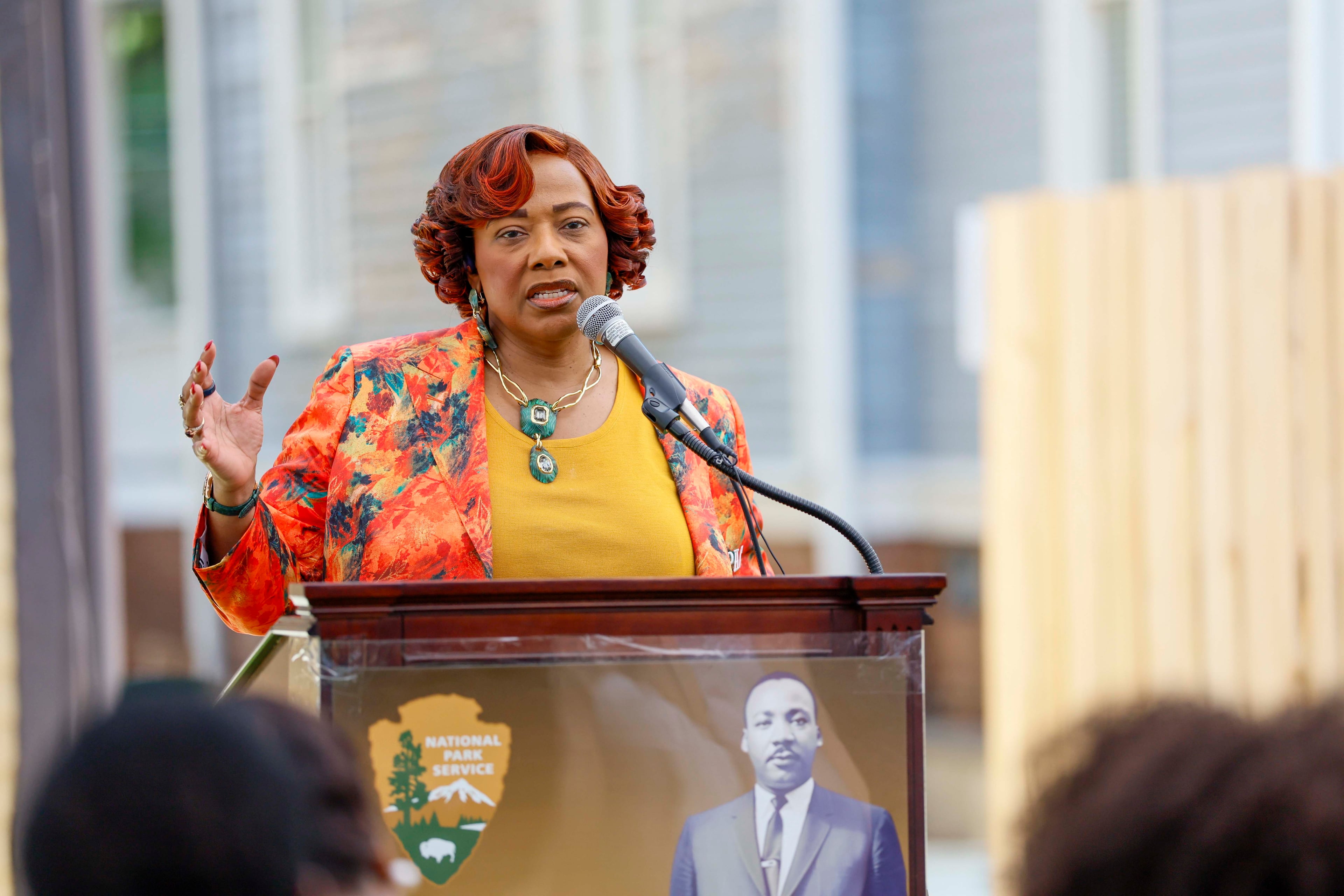Bernice King speaks to visitors at the ribbon-cutting event marking the restoration of her father's childhood home, on Thursday, July 2, 2026. (Miguel Martinez/AJC)