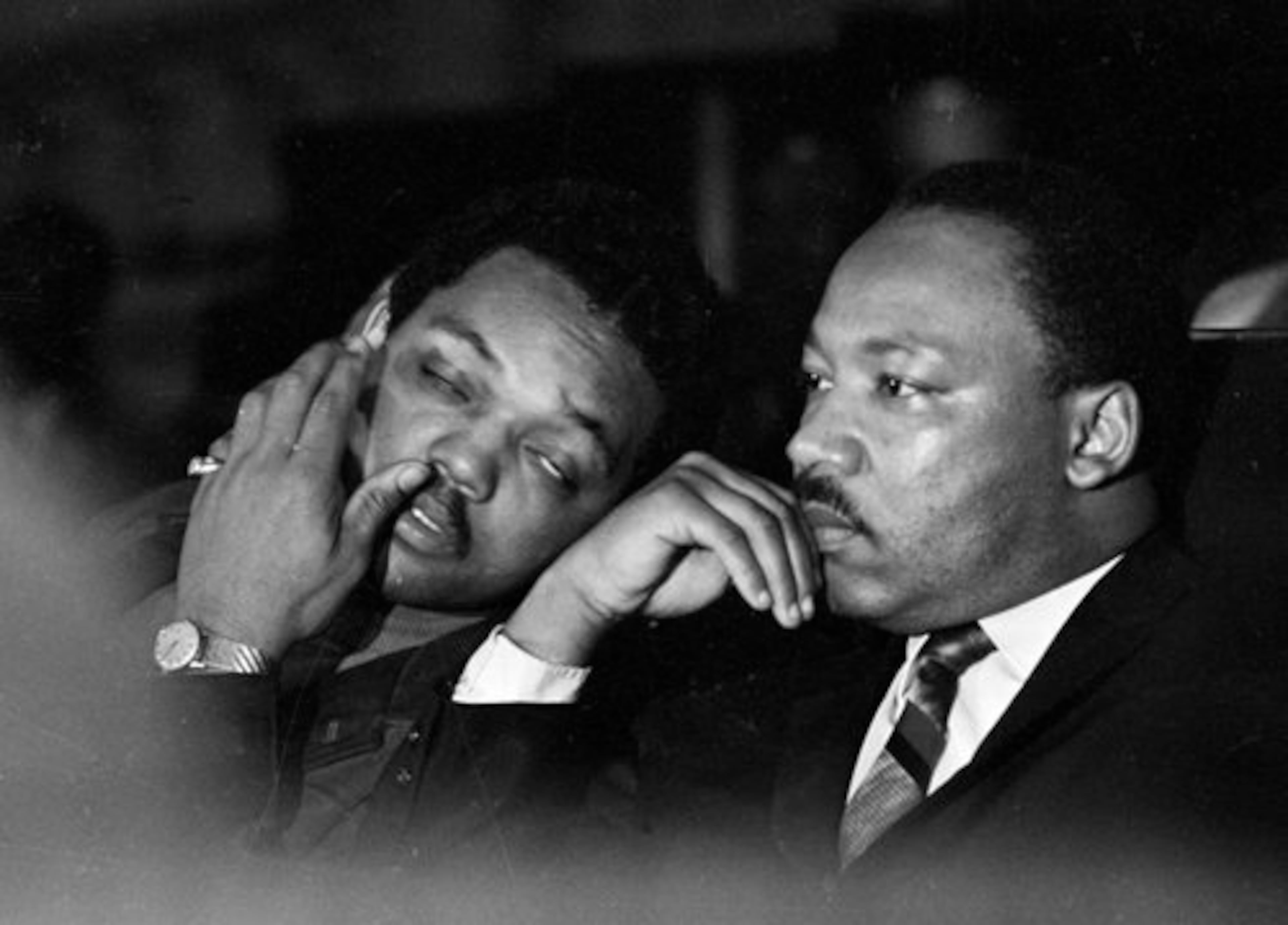 Dr. Martin Luther King, Jr. is seen here with Rev. Jesse Jackson (left) just before King's final public appearance to address striking Memphis sanitation workers on April 4, 1968. (Charles Kelly/AP).