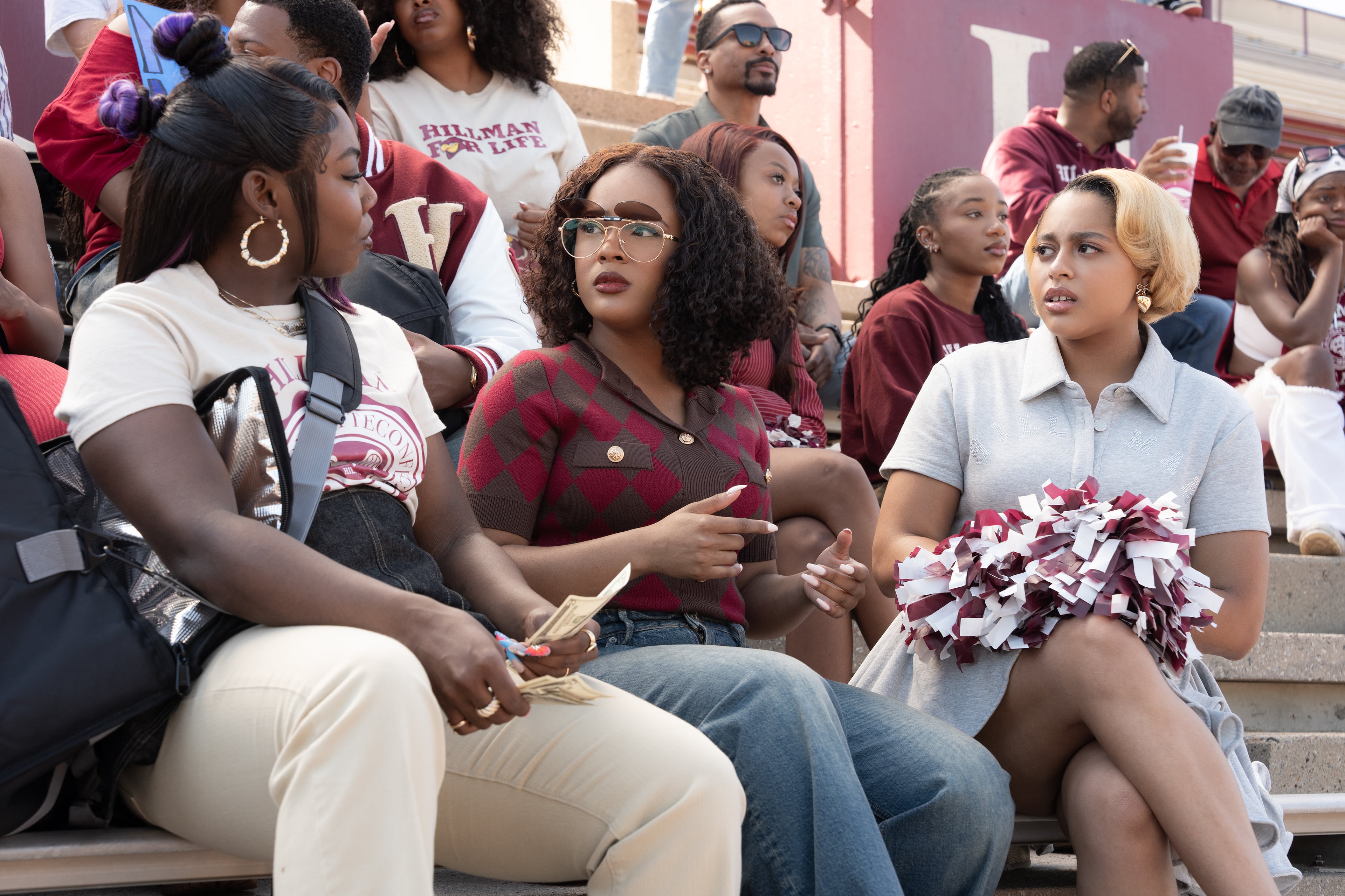 The second episode of "A Different World" features a football game set at B.T. Harvey Stadium at Morehouse College. (L to R) Alijah Kai as Rashida, Maleah Joi Moon as Deborah, Kennedi Reece as Hazel. (Courtesy of Daniel Delgado Jr./Netflix)