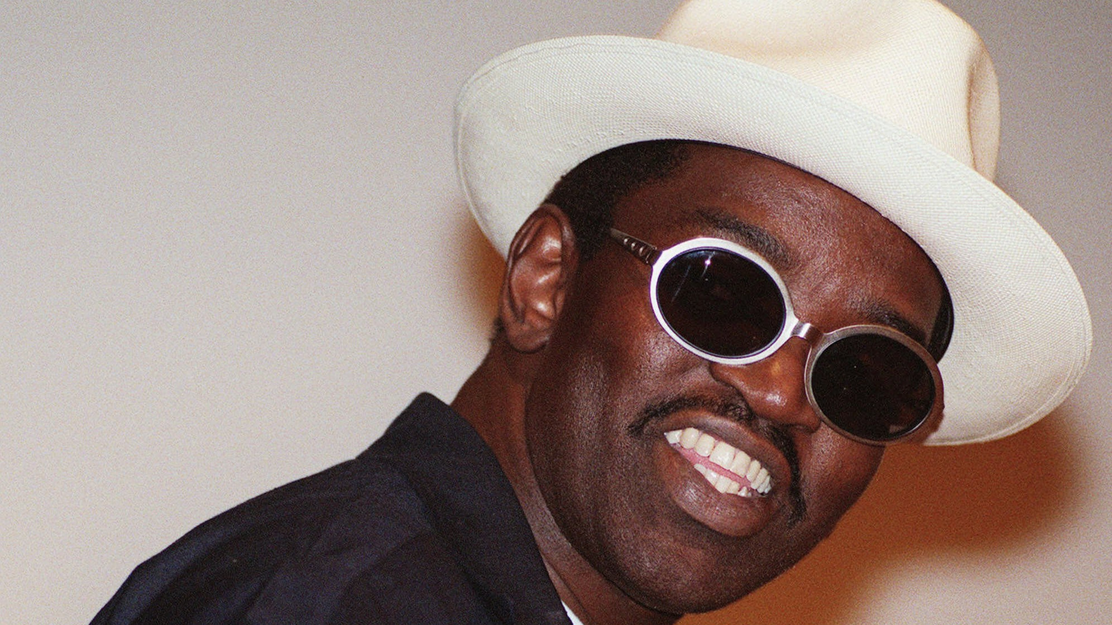 Fred Brathwaite, better known as Fab 5 Freddy, addresses a conference on hip-hop culture at UCLA on May 14, 1999. He's coming to Atlanta to promote his new memoir. (Damian Doverganes/AP)
