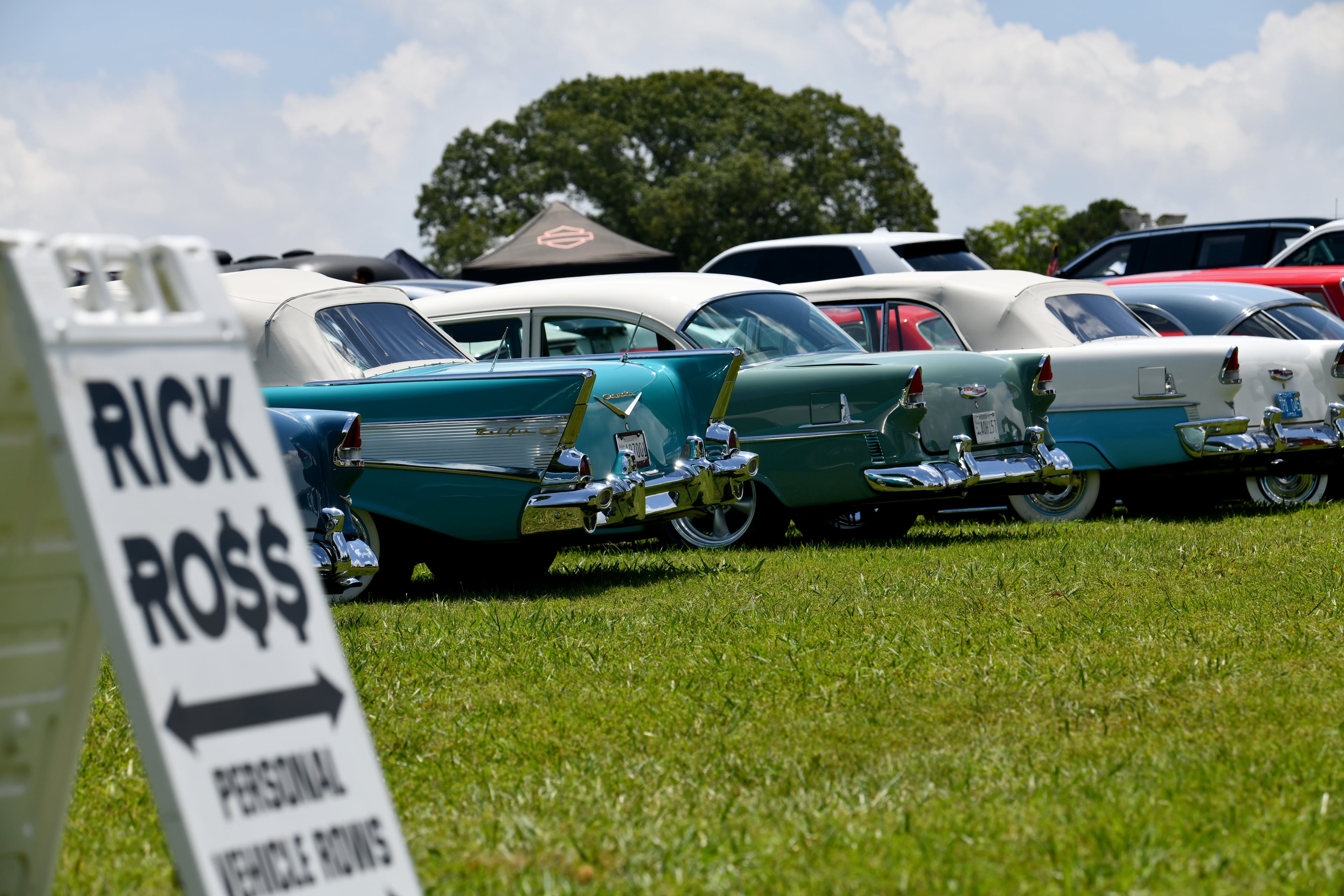 Rick Ross’s personal vehicles are displayed during the 4th Annual Rick Ross Car and Bike Show, Saturday, June 7, 2025, in Fayetteville. The 4th Annual Rick Ross Car and Bike Show will include a vendor market with more than 30 vendors, food trucks, fleets of classic/custom automobiles, luxury vehicles, boats, RVs and trailers on the front of the mansion. Stage performances include Plies, Ross' new signee Nino Breeze and Ross himself. (Hyosub Shin / AJC)