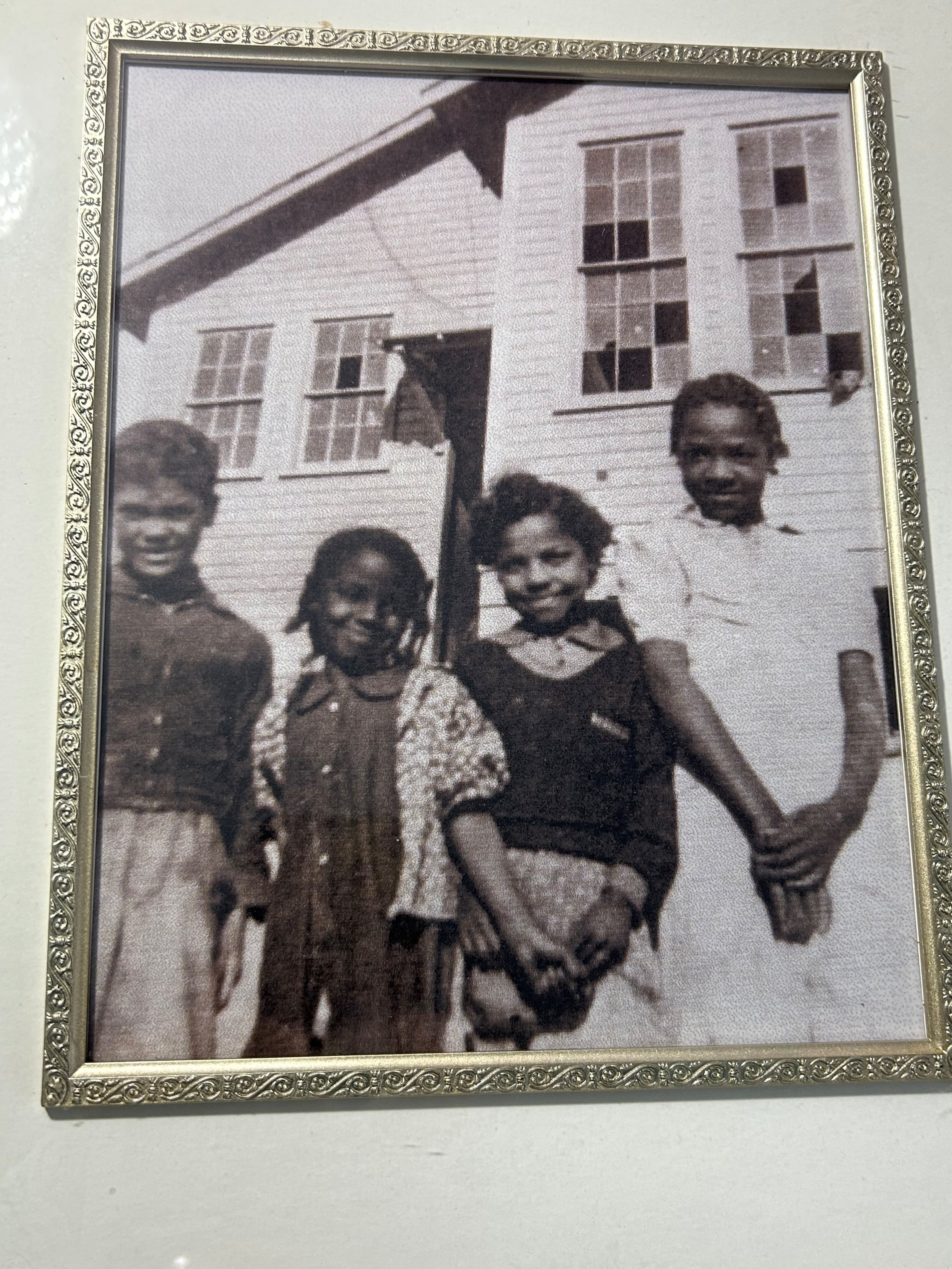 Howard's grandmother Lelia Whitson (far right) stands with friends in southeastern Kentucky. (Courtesy of Theresa Diana Macon)