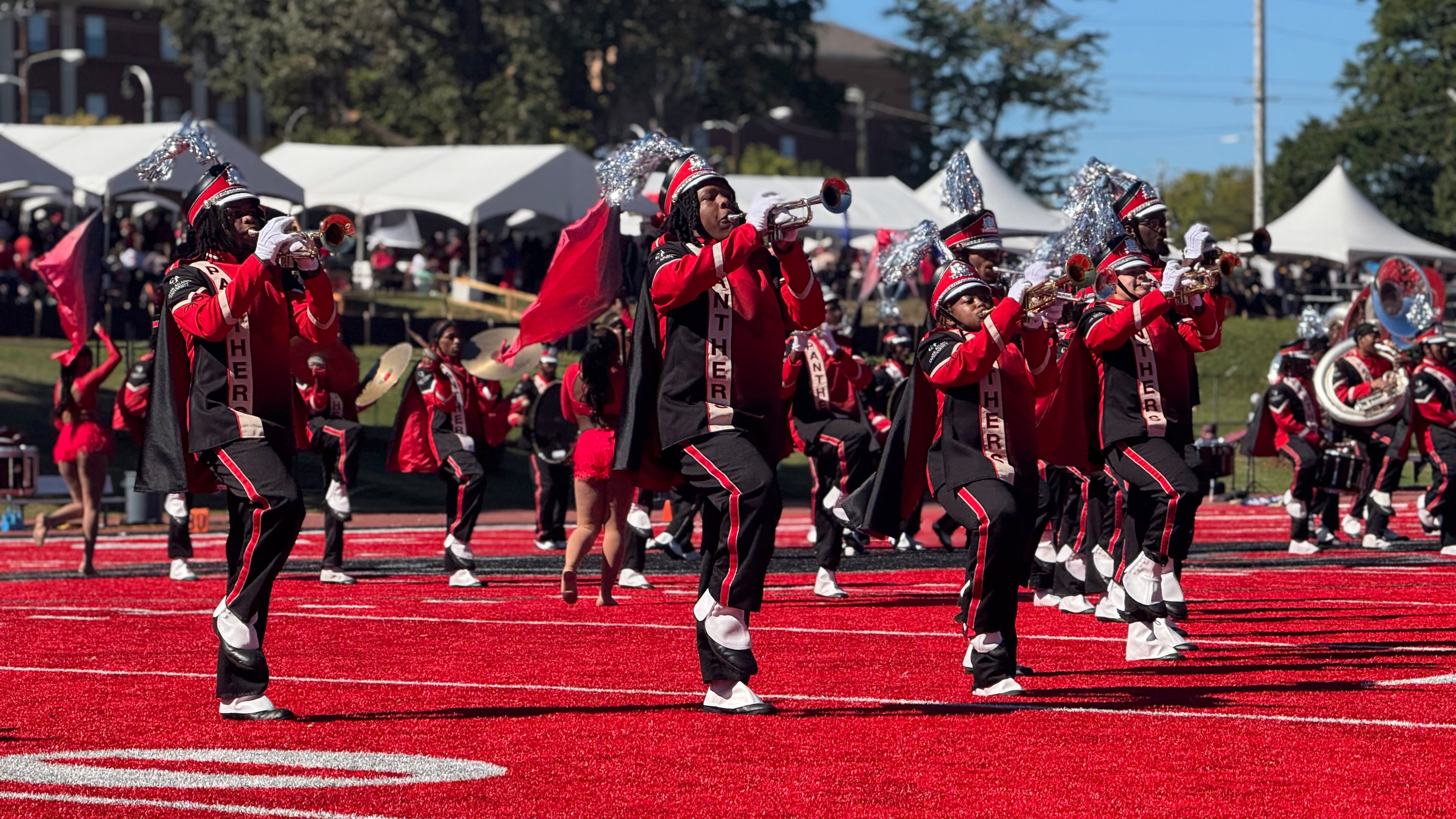 Members of the Mighty Marching Panthers marching band at Clark Atlanta University perform during halftime at homecoming football game against Allen University on Oct. 17, 2026. (Photo by Brooke Leigh Howard/AJC)